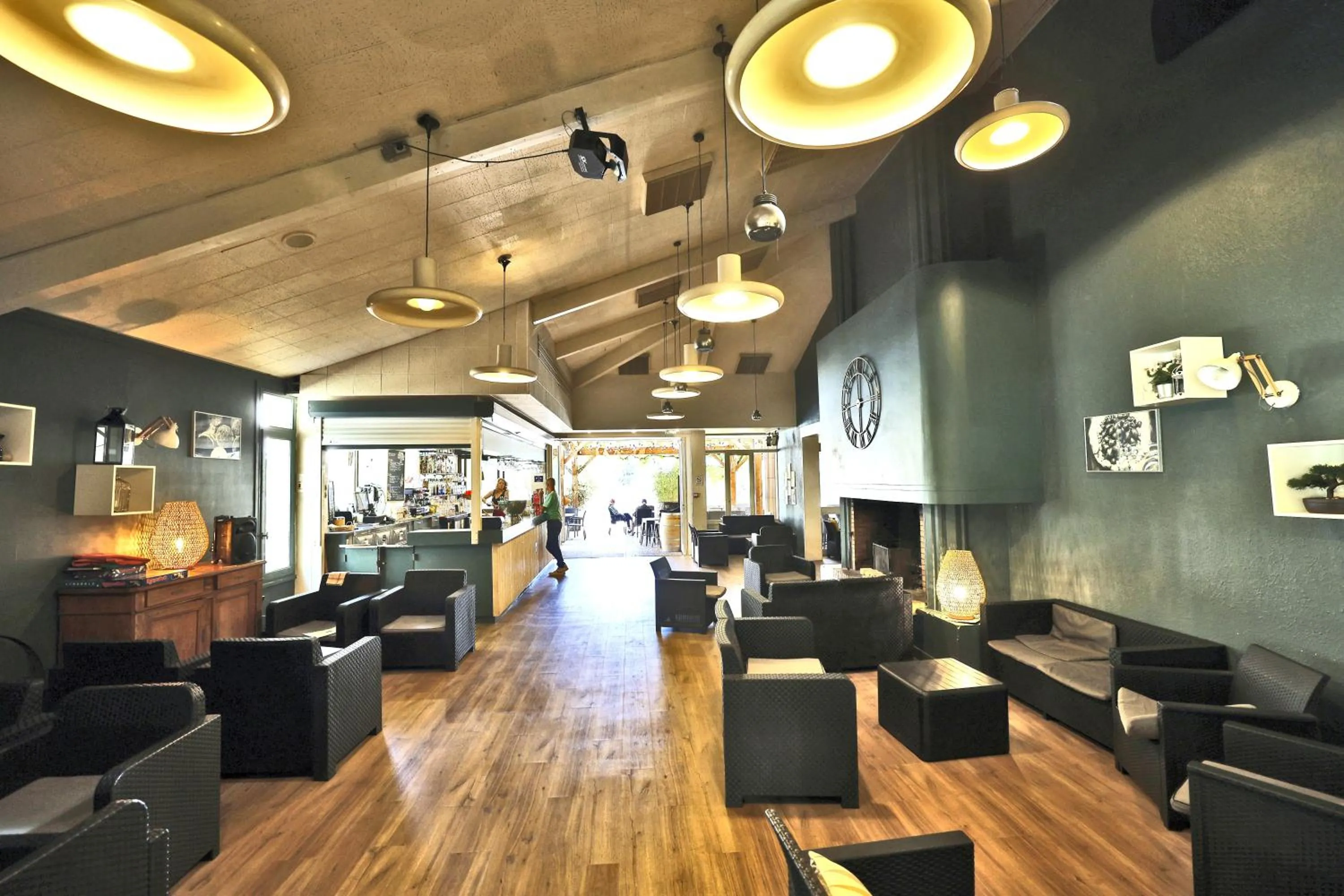 Lounge or bar in Village vacances Le Hameau des Oliviers
