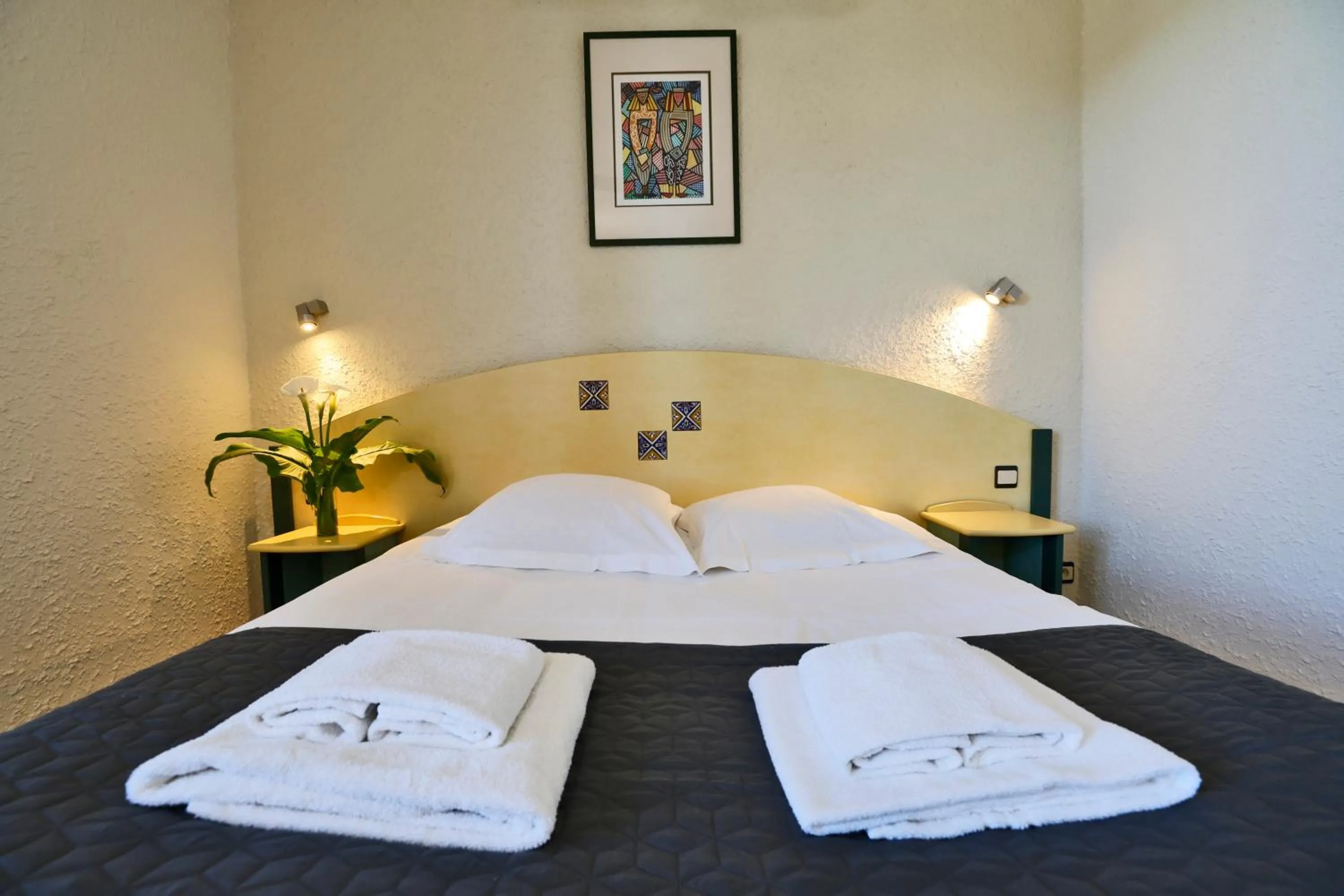 Bed in Village vacances Le Hameau des Oliviers
