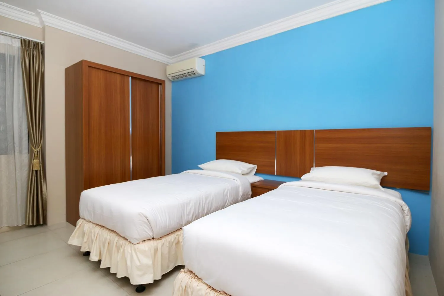 Bedroom, Bed in Safina Inn Syariah Sekupang Batam