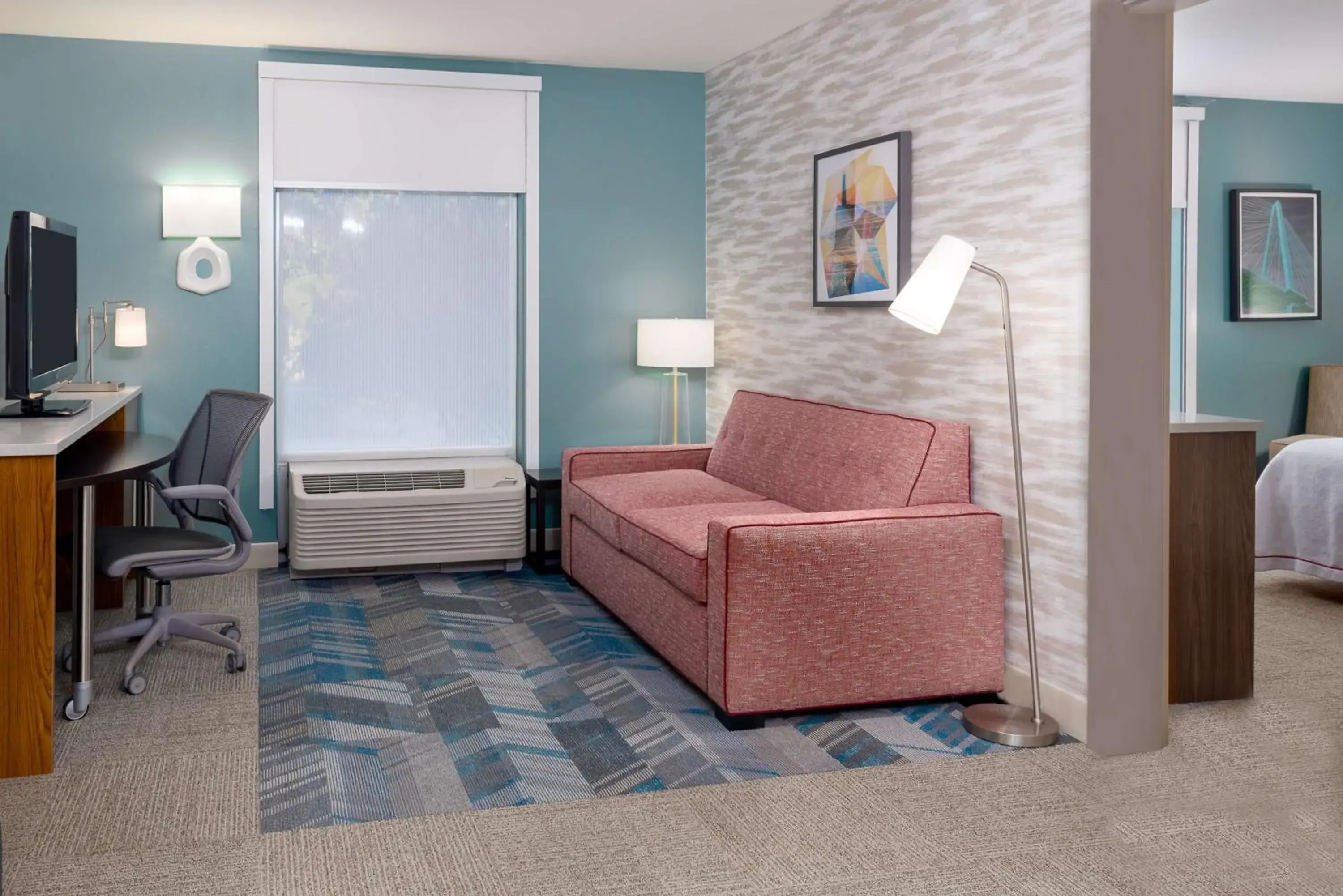 Seating area, Bed in Home2 Suites by Hilton Charleston Airport Convention Center, SC Seating area, Bed in Home2 Suites by Hilton Charleston Airport Convention Center, SC