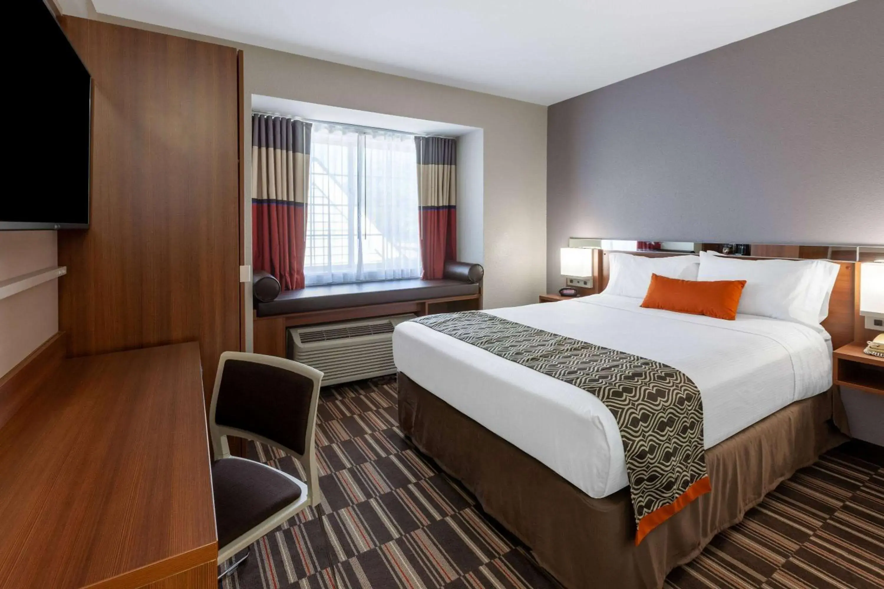 Photo of the whole room, Bed in Microtel Inn & Suites by Wyndham Sunbury - Columbus North Photo of the whole room, Bed in Microtel Inn & Suites by Wyndham Sunbury - Columbus North