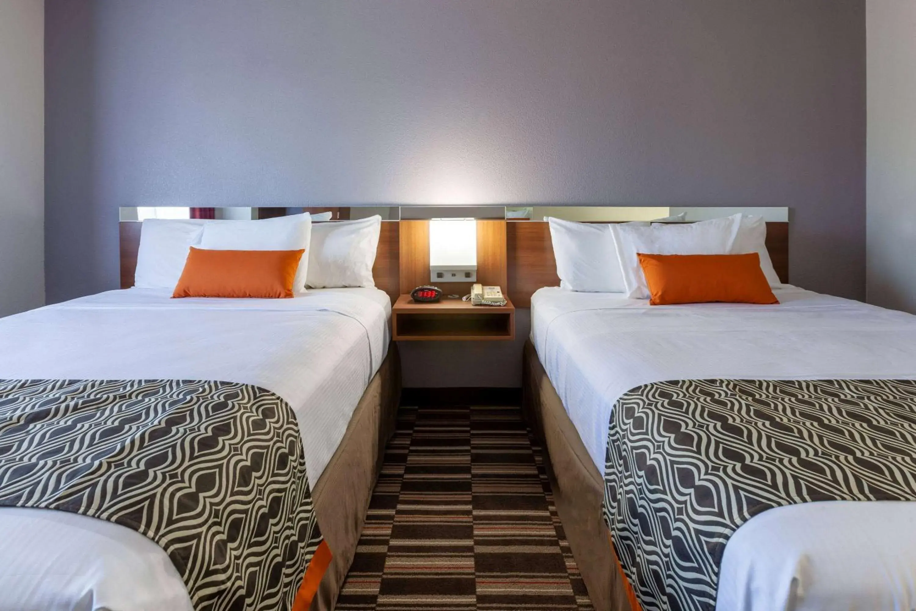 Photo of the whole room, Bed in Microtel Inn & Suites by Wyndham Sunbury - Columbus North Photo of the whole room, Bed in Microtel Inn & Suites by Wyndham Sunbury - Columbus North