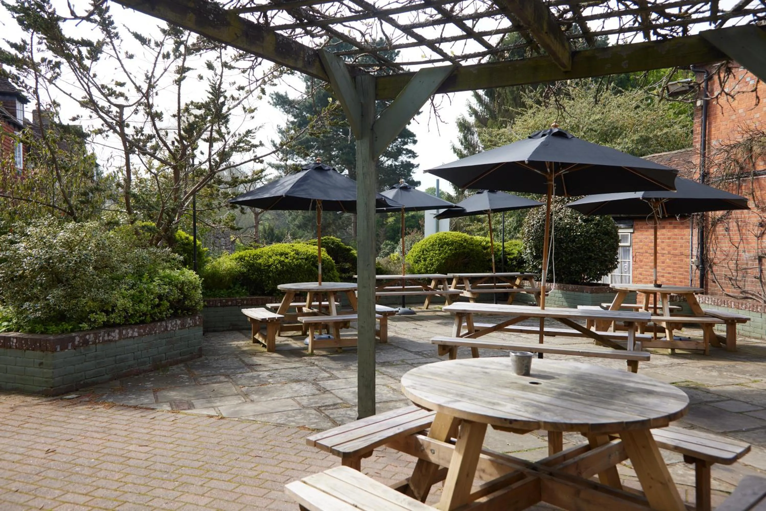 Patio in Kings Arms Hotel by Greene King Inns