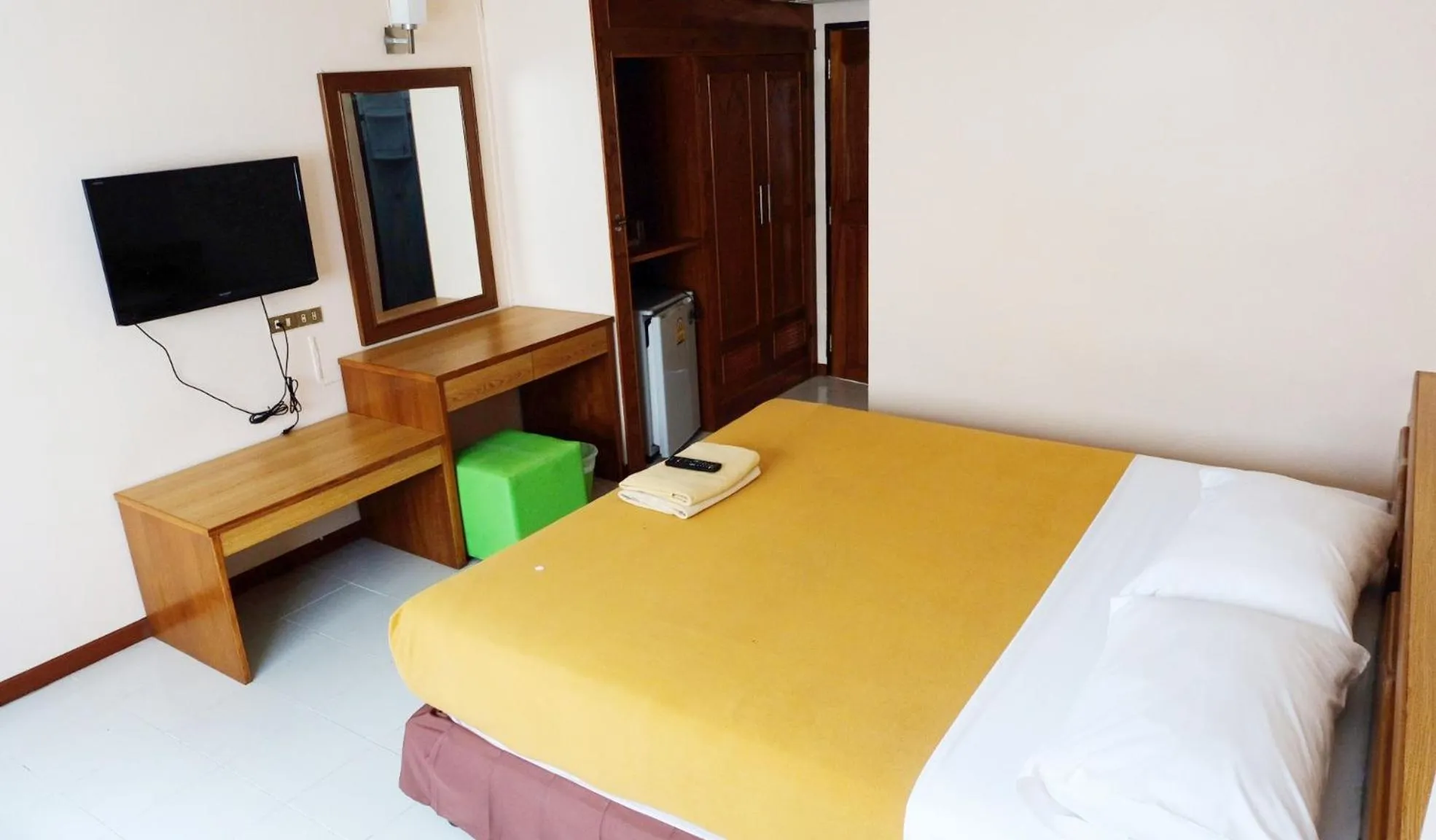 Bed in Top Thai Hotel