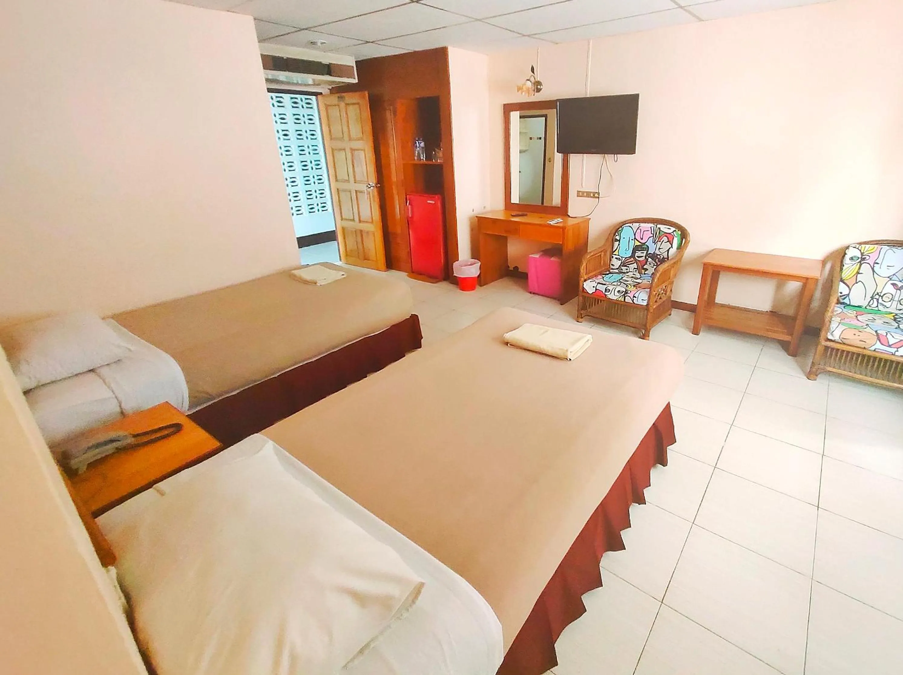 Bed in Top Thai Hotel