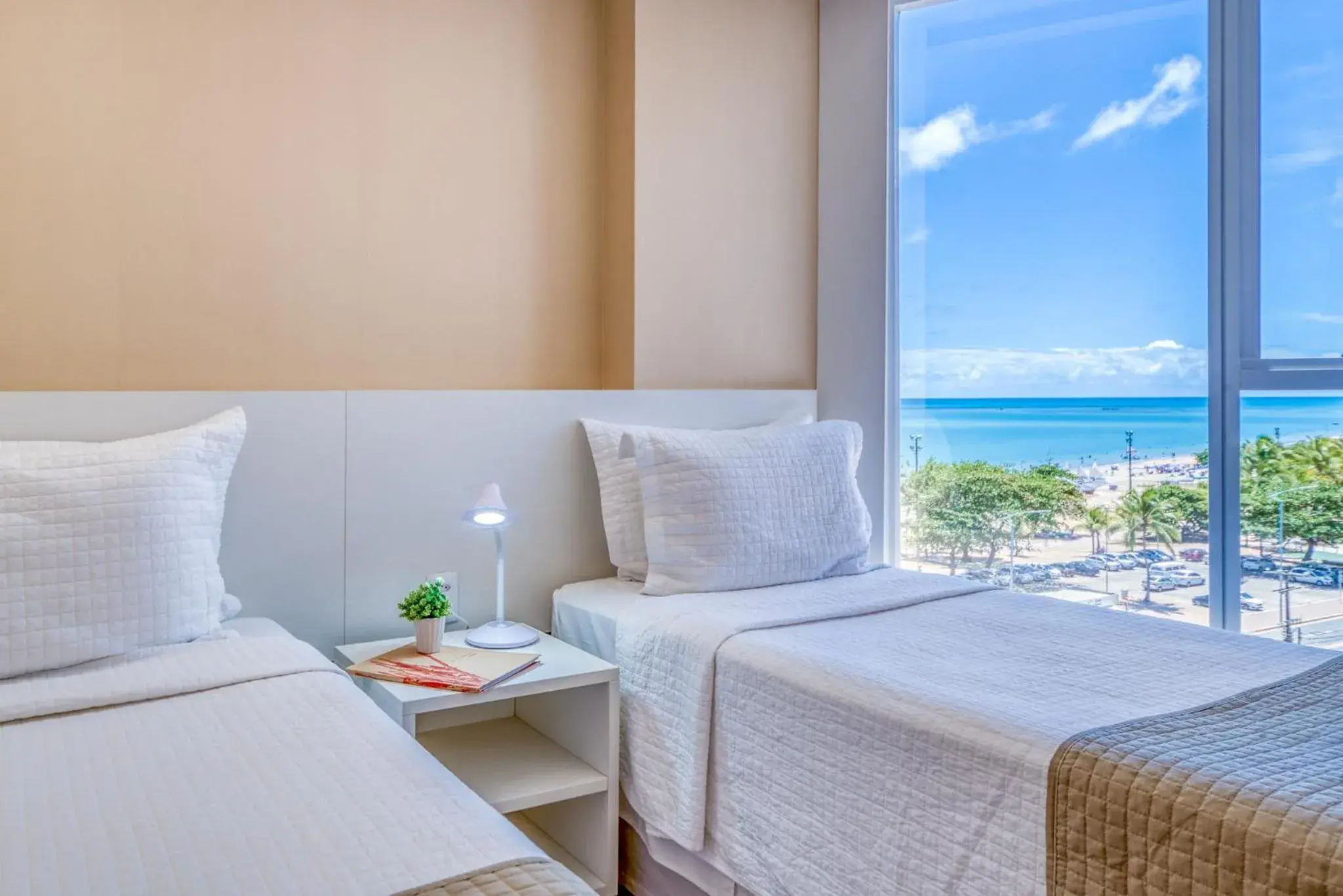 Premium Triple with Side Sea View (3 Single Beds) in Hotel Brisa Suítes Pajuçara Premium Triple with Side Sea View (3 Single Beds) in Hotel Brisa Suítes Pajuçara