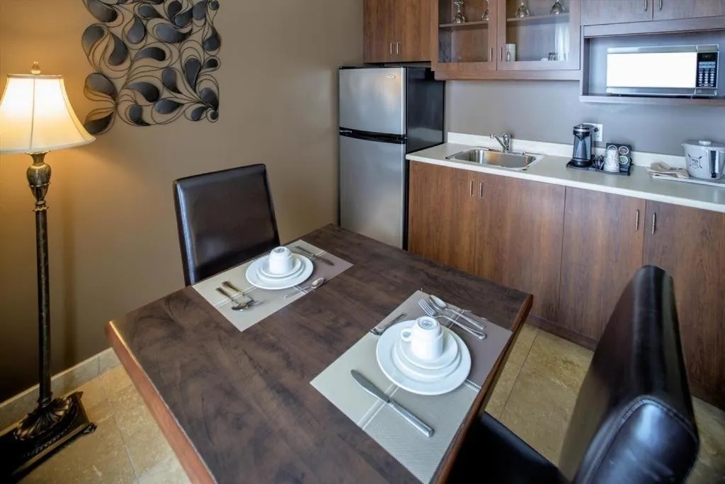 Kitchen or kitchenette in Hotel Brossard