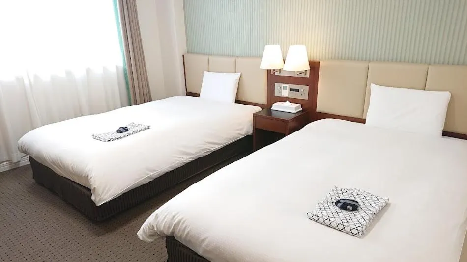 Bed in West Inn Fuji-Yoshida