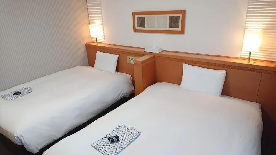 Bed in West Inn Fuji-Yoshida