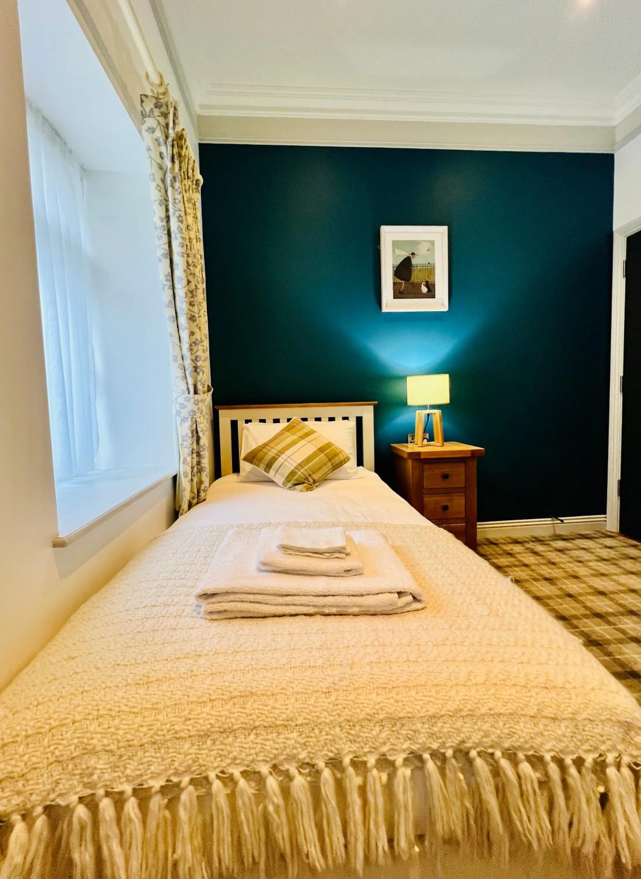 Bed in Zoe Bistro & Accommodation