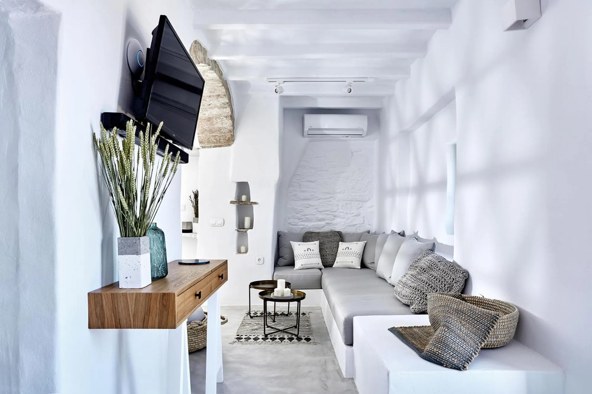 Seating area in Living Theros Luxury Suites