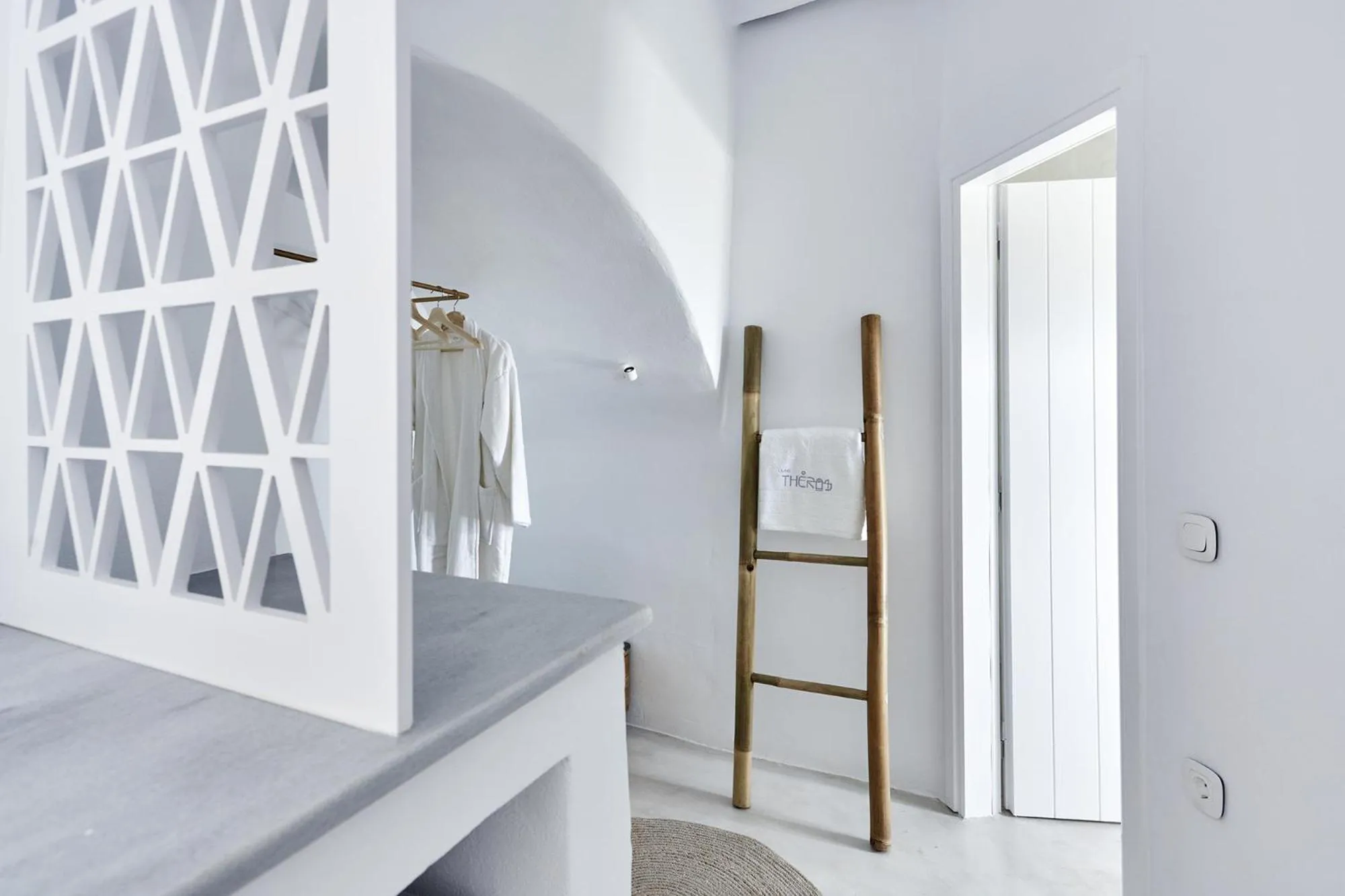 Decorative detail, Bed in Living Theros Luxury Suites