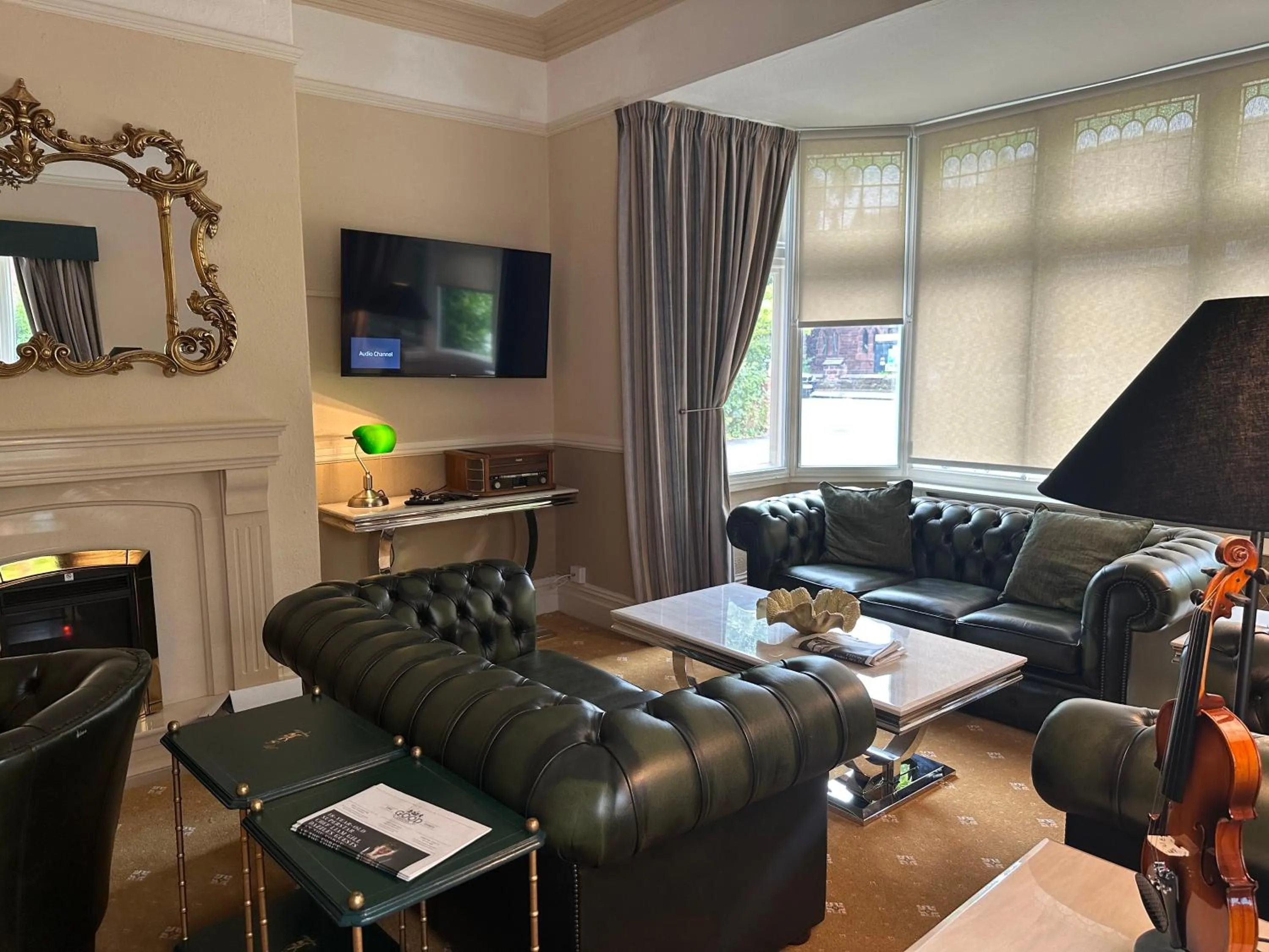 Communal lounge/ TV room in Chester House Guest House