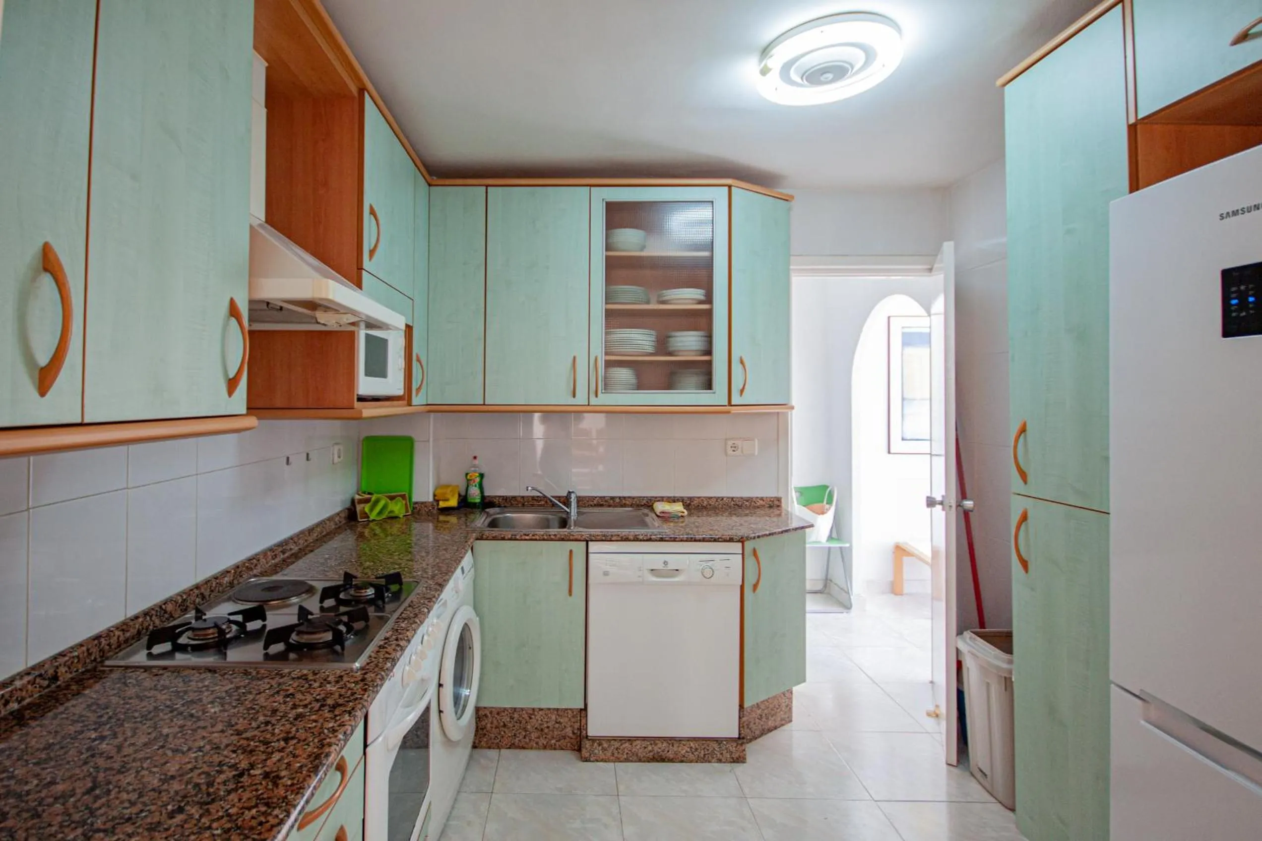 Kitchen or kitchenette in Inmovecos apart con piscina Alisios 227