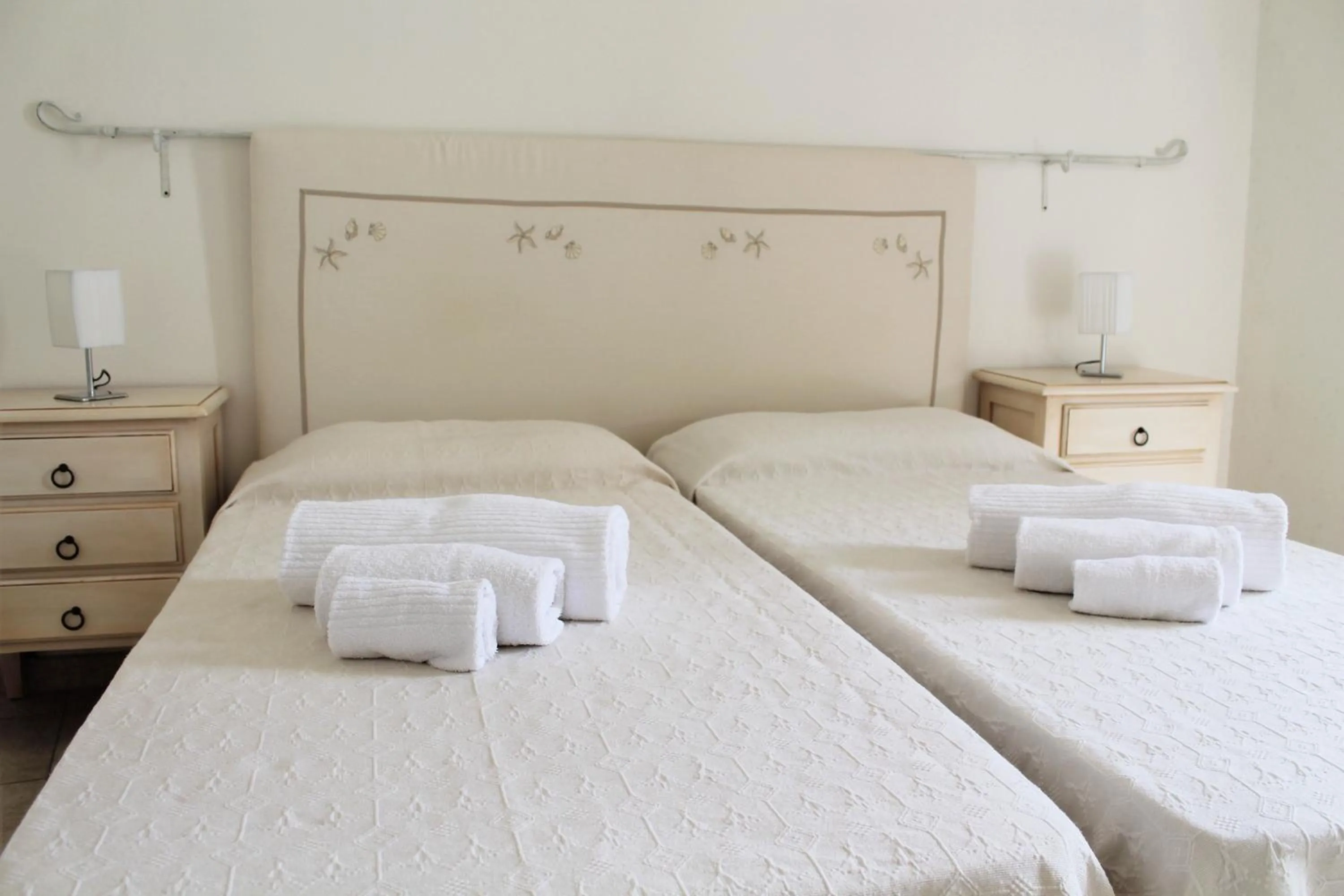 Bed in AHR Leonis Residence La Maddalena