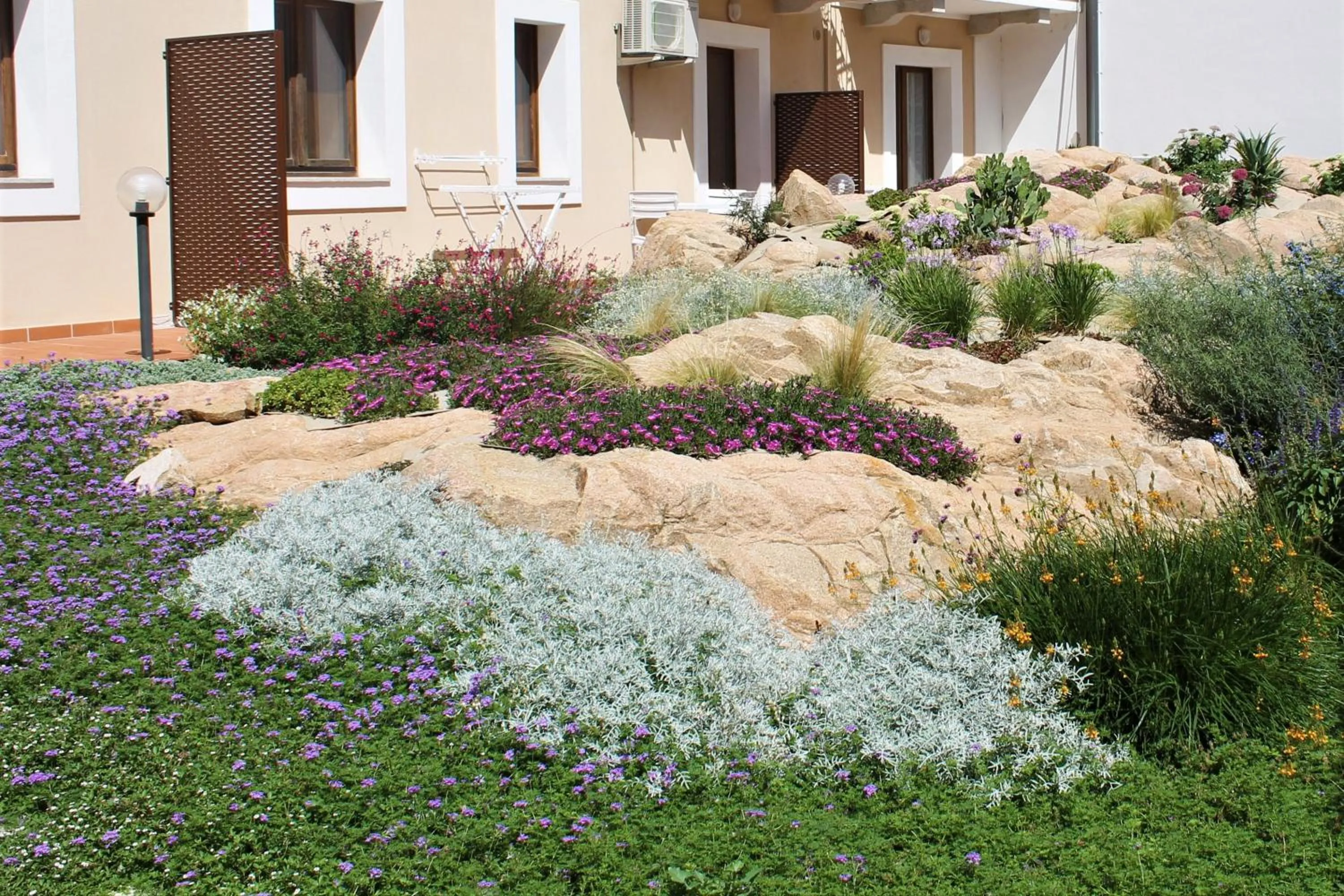 Garden in AHR Leonis Residence La Maddalena