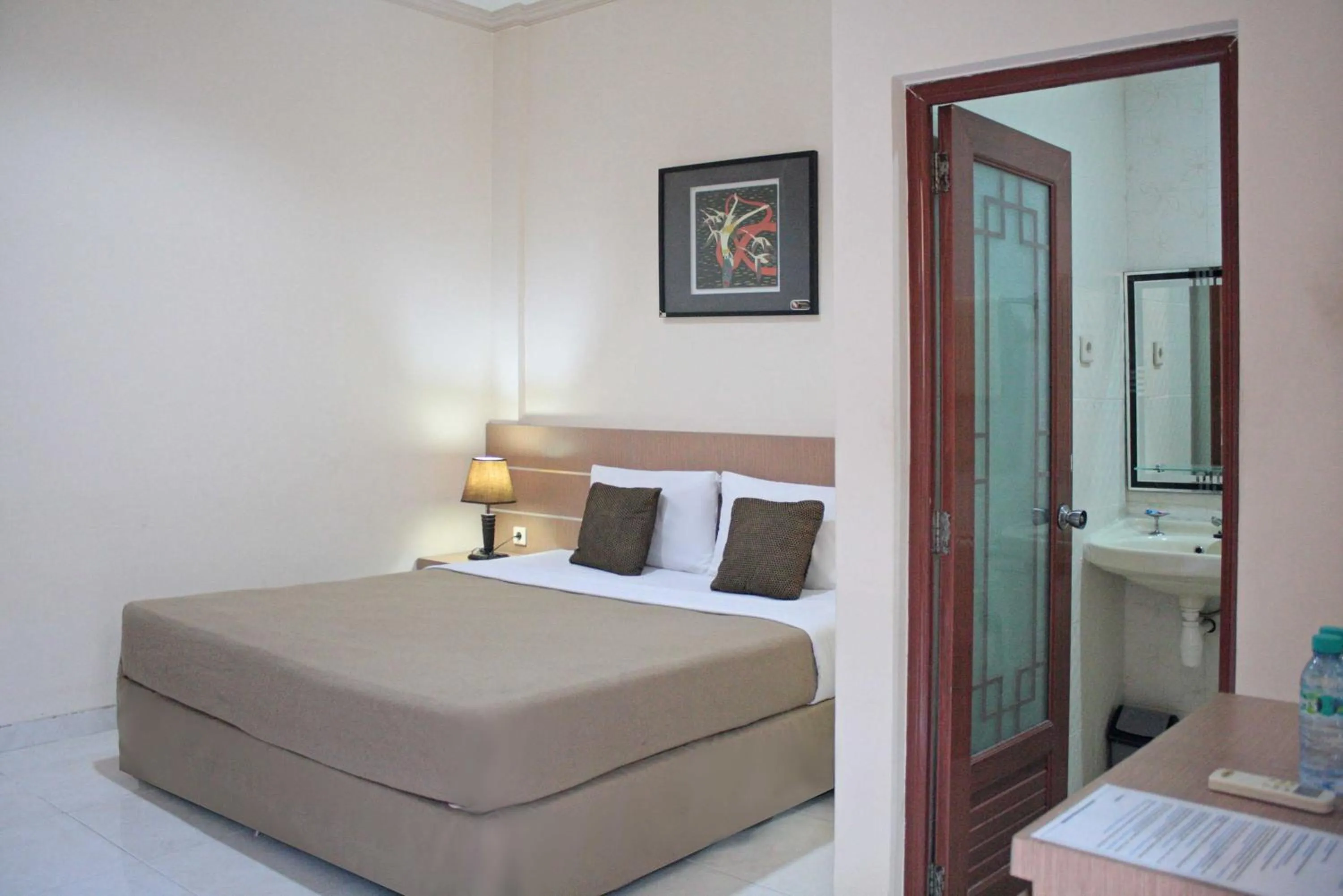 Bed in Hotel Graha DPT 33