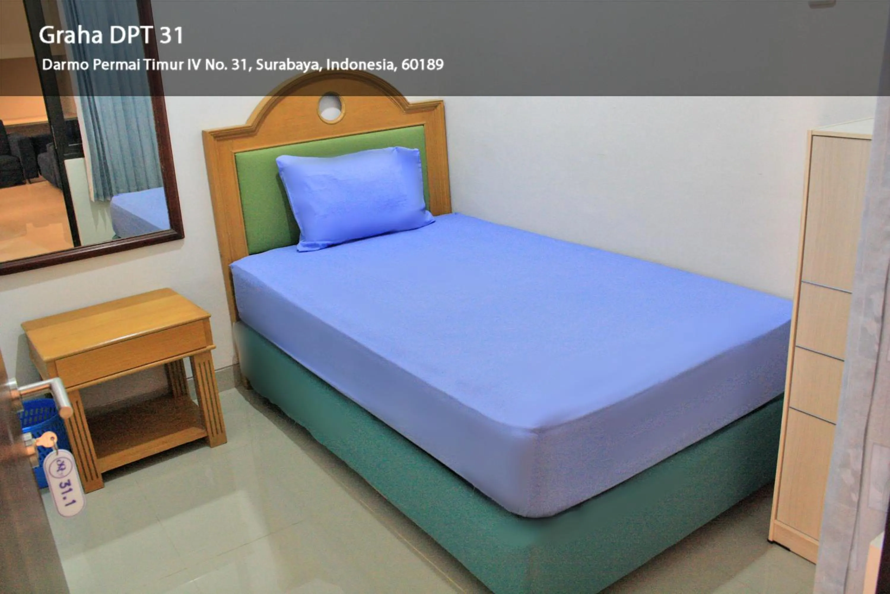 Bed in Hotel Graha DPT 33