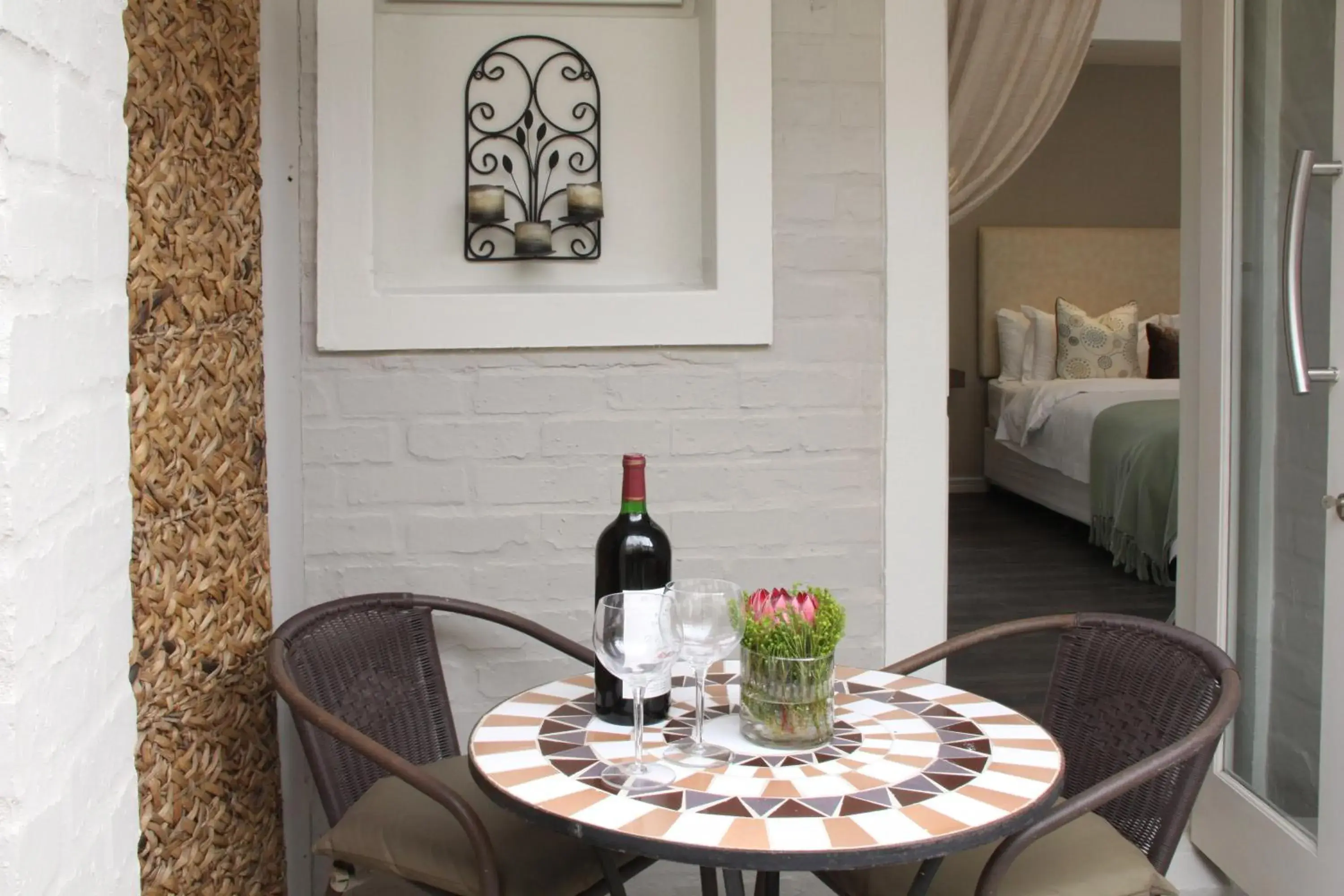 Balcony/Terrace, Bed in Hermanus Lodge on the Green - Solar Power Balcony/Terrace, Bed in Hermanus Lodge on the Green - Solar Power