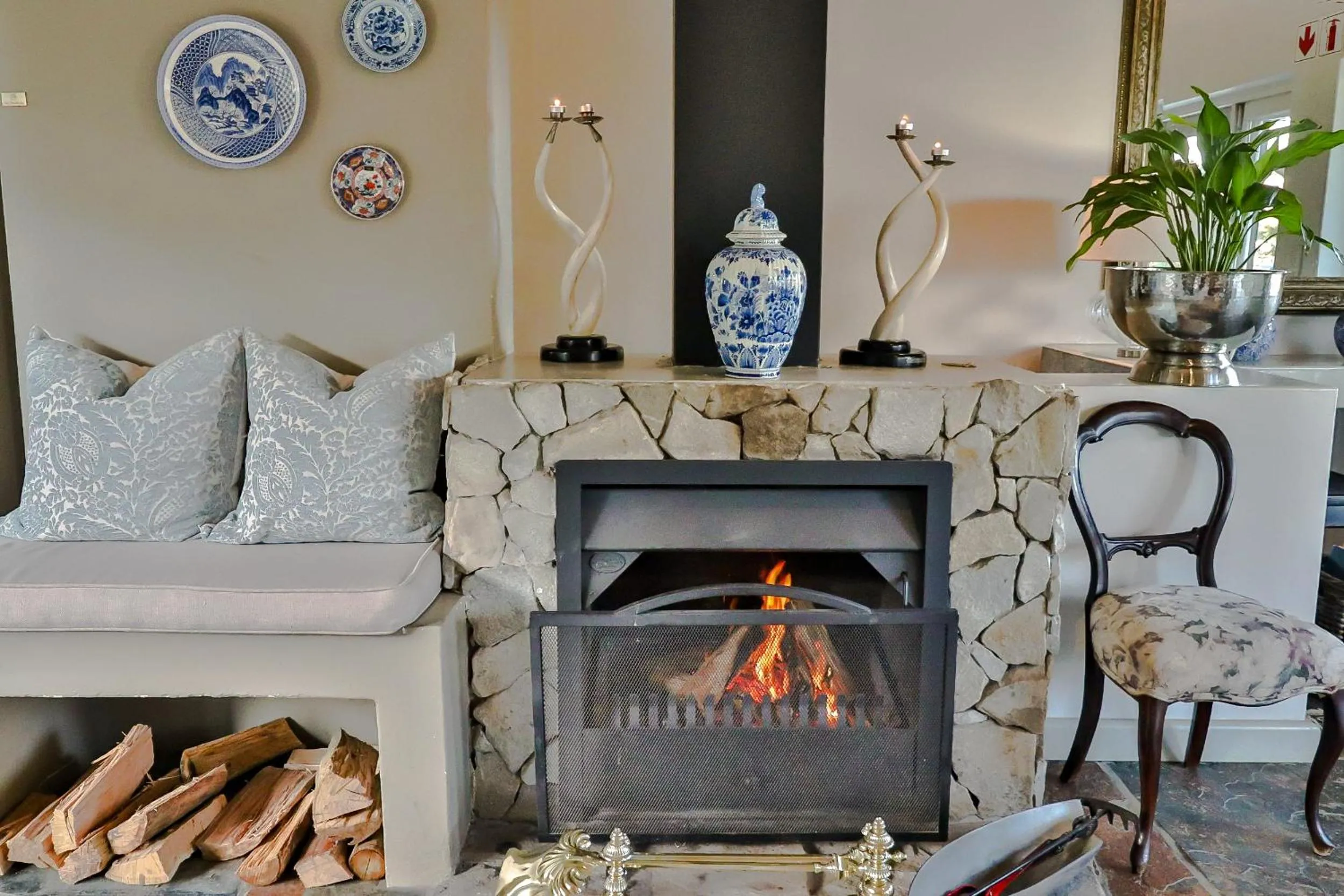 Communal lounge/ TV room in Hermanus Lodge on the Green - Solar Power