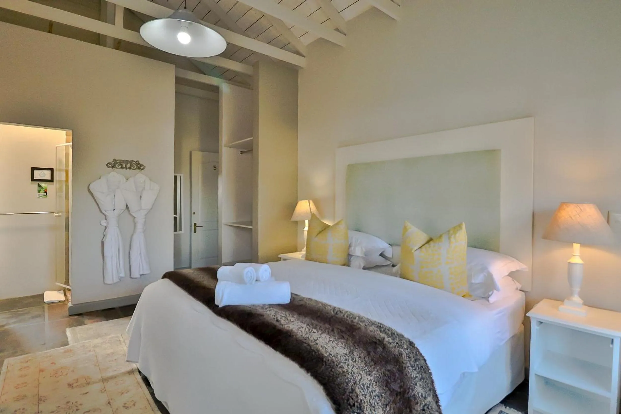 Bedroom, Bed in Hermanus Lodge on the Green - Solar Power