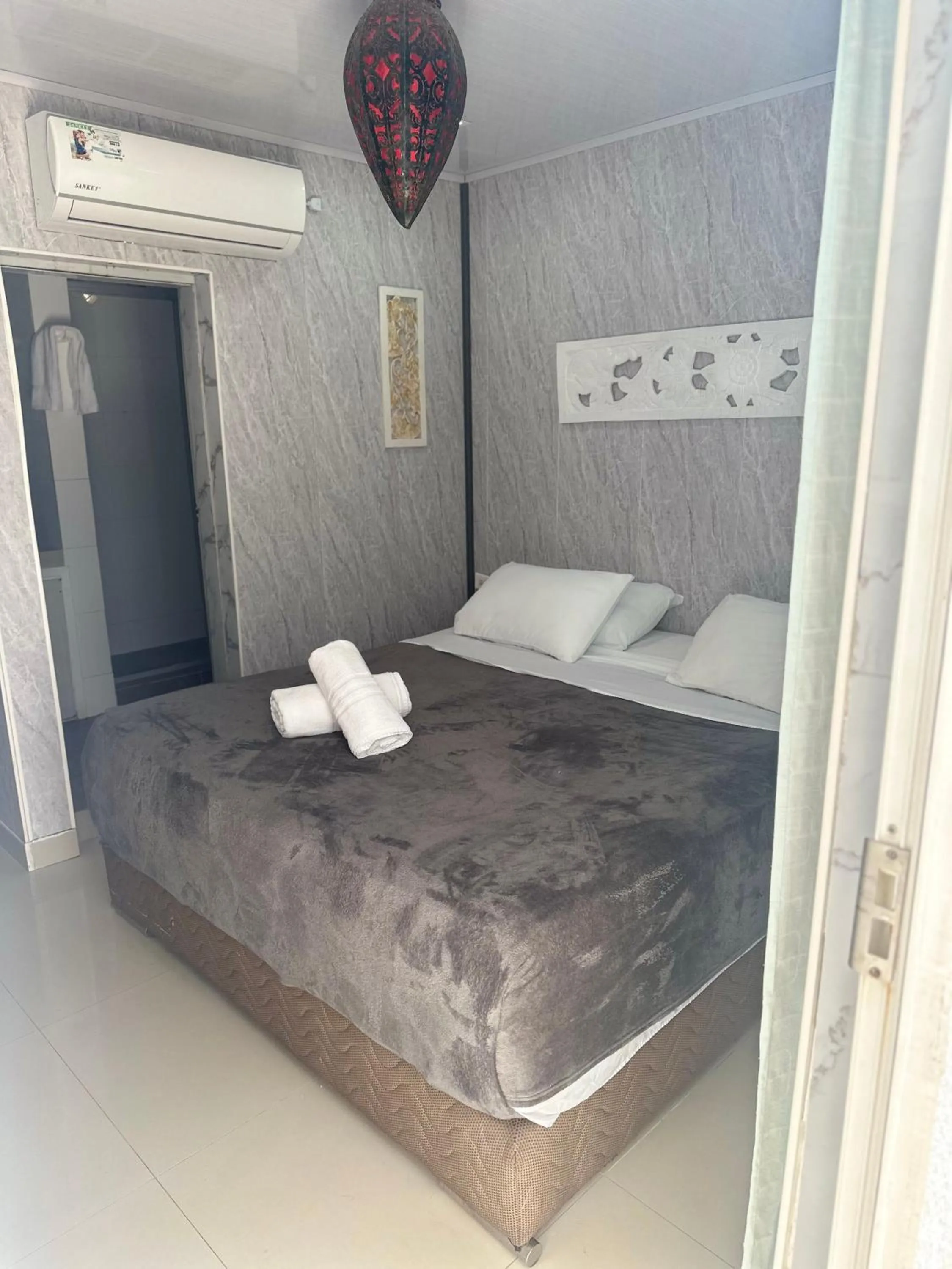 Bed in Le Castel Blanc Hotel Boutique