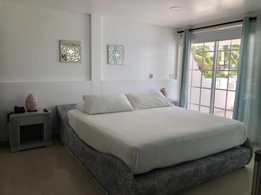 Bed in Le Castel Blanc Hotel Boutique