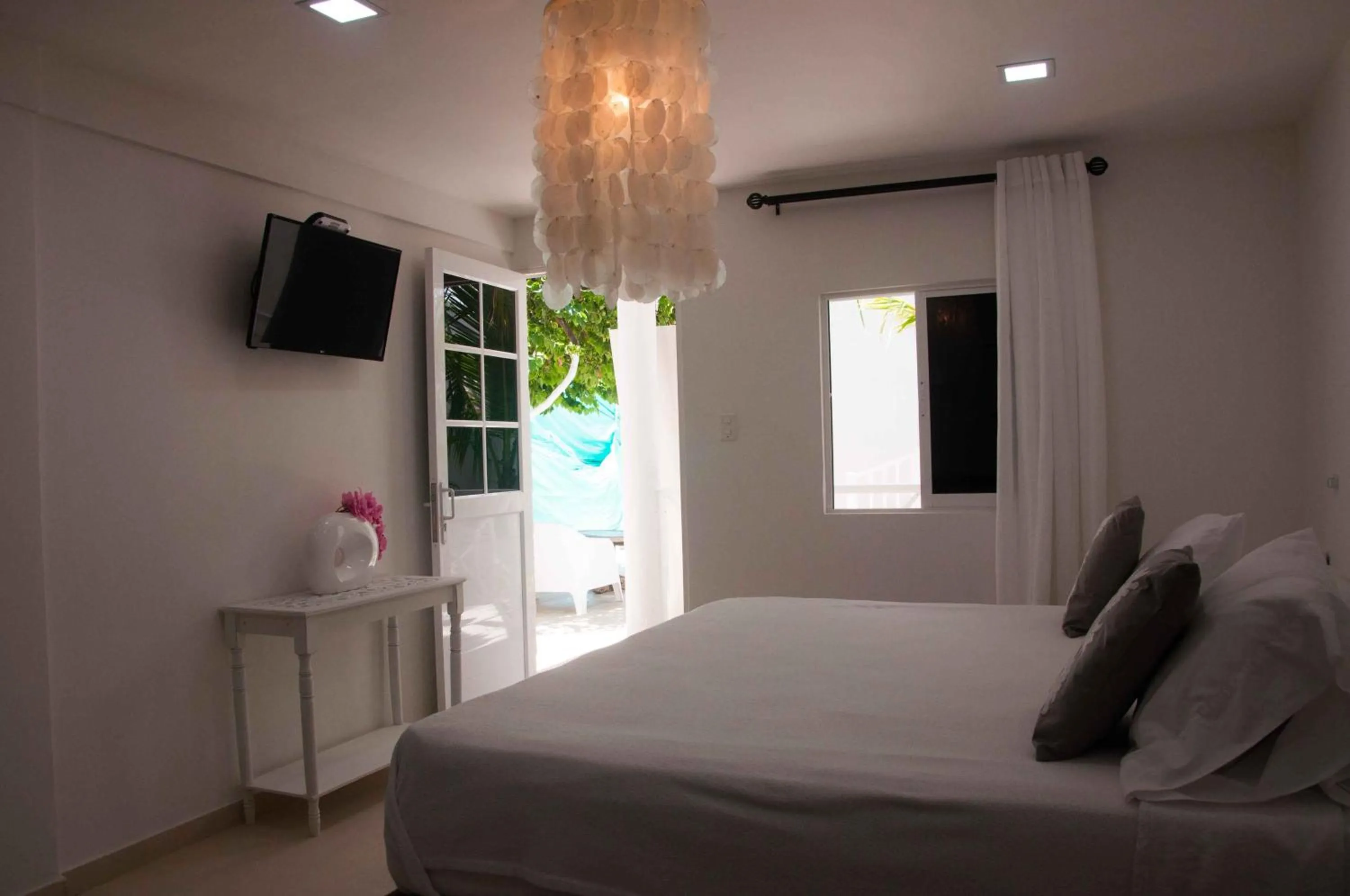 Bed in Le Castel Blanc Hotel Boutique