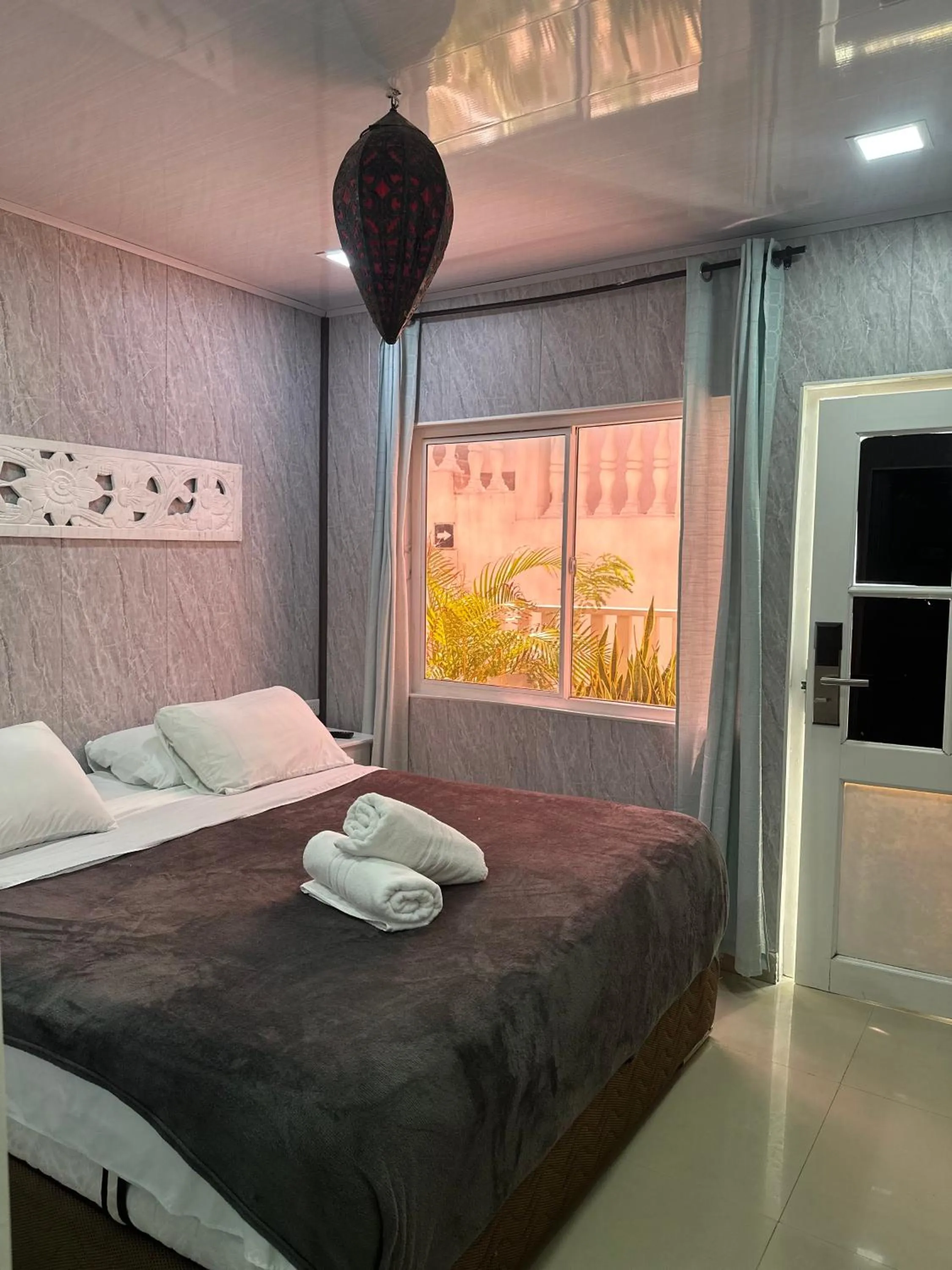 Bed in Le Castel Blanc Hotel Boutique