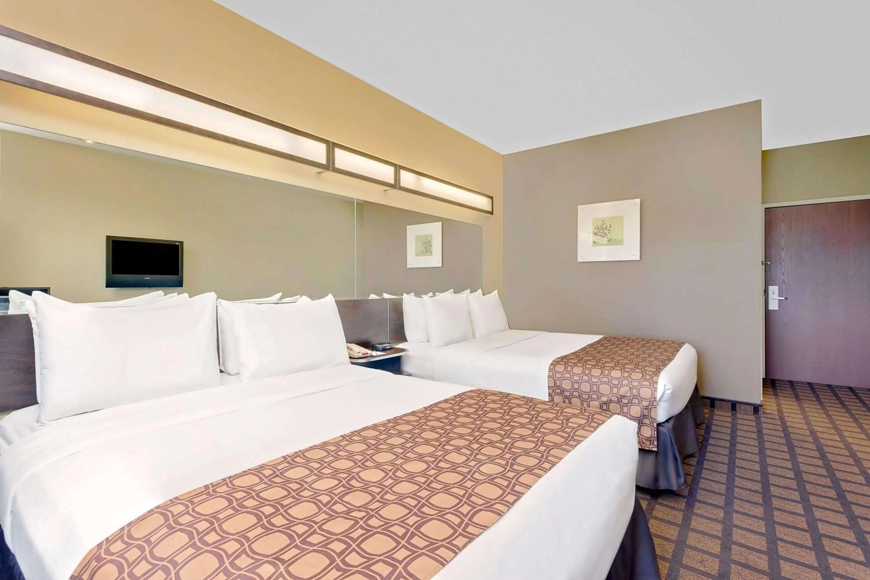 Bed in Microtel by Wyndham Perry National Fairground Area I-75