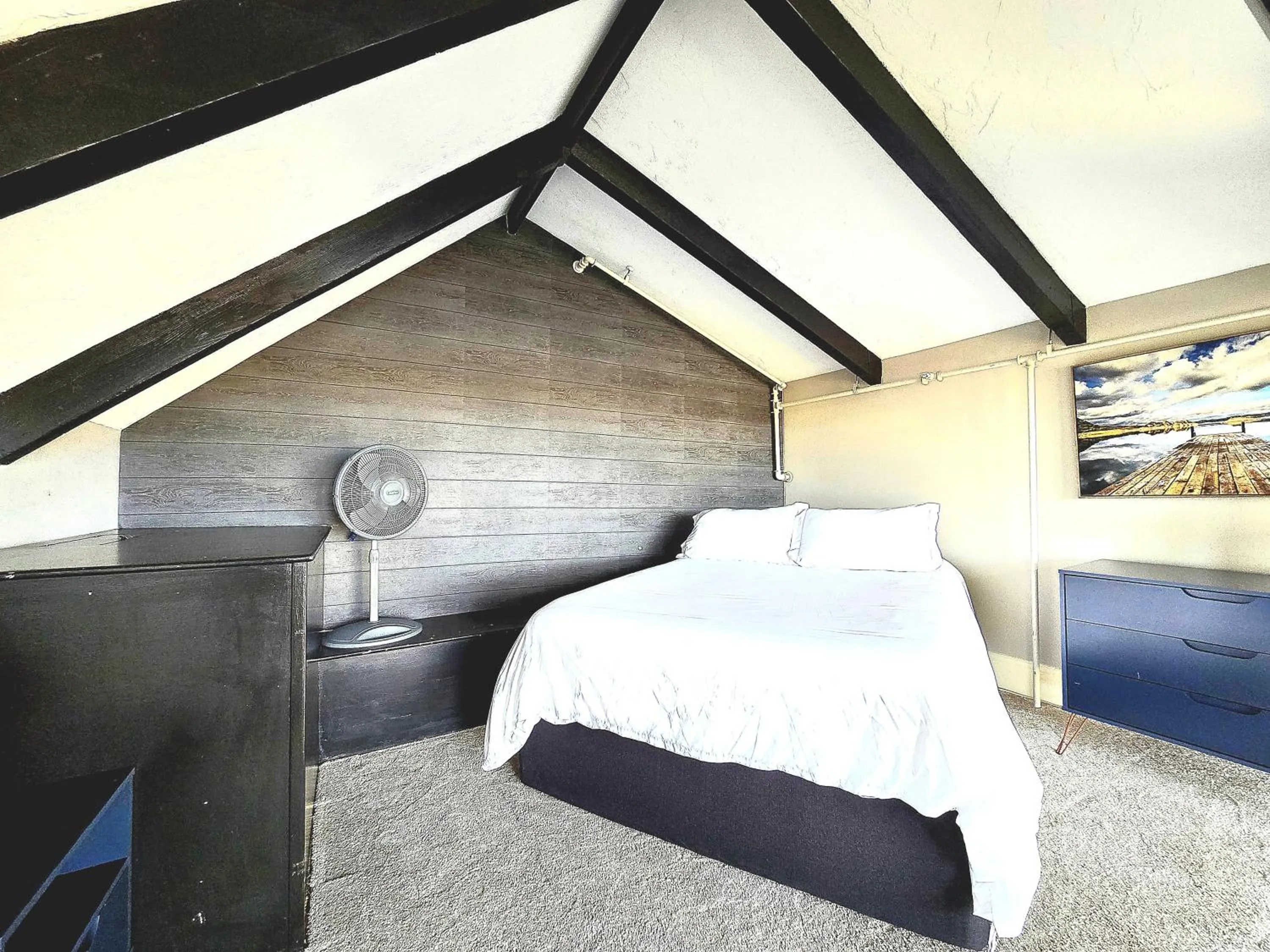 Bed in Gunstock Inn & Suites