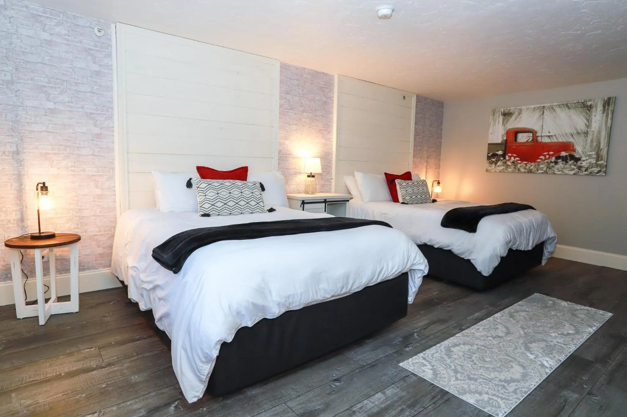 Bed in Gunstock Inn & Suites