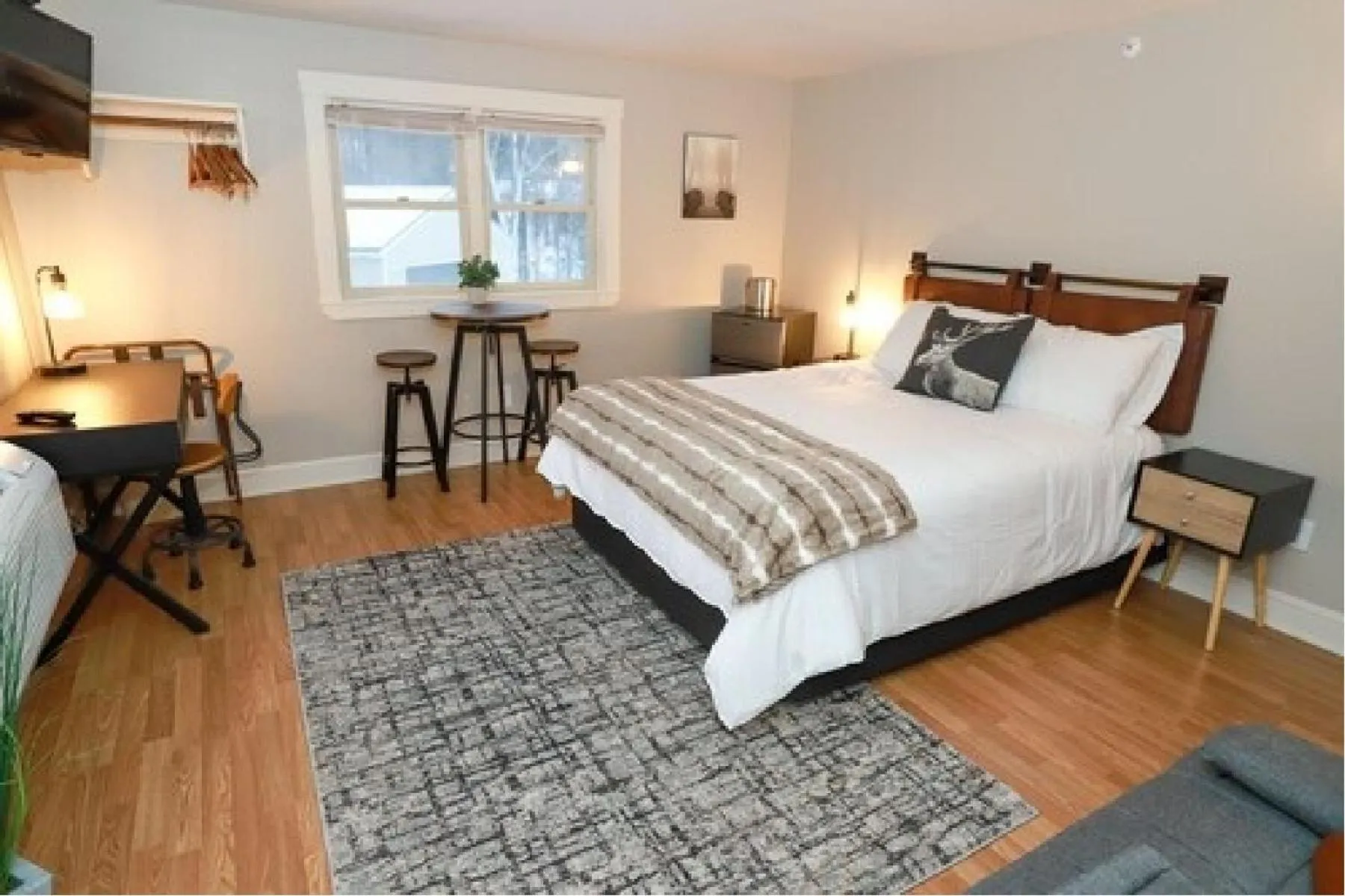 Bed in Gunstock Inn & Suites