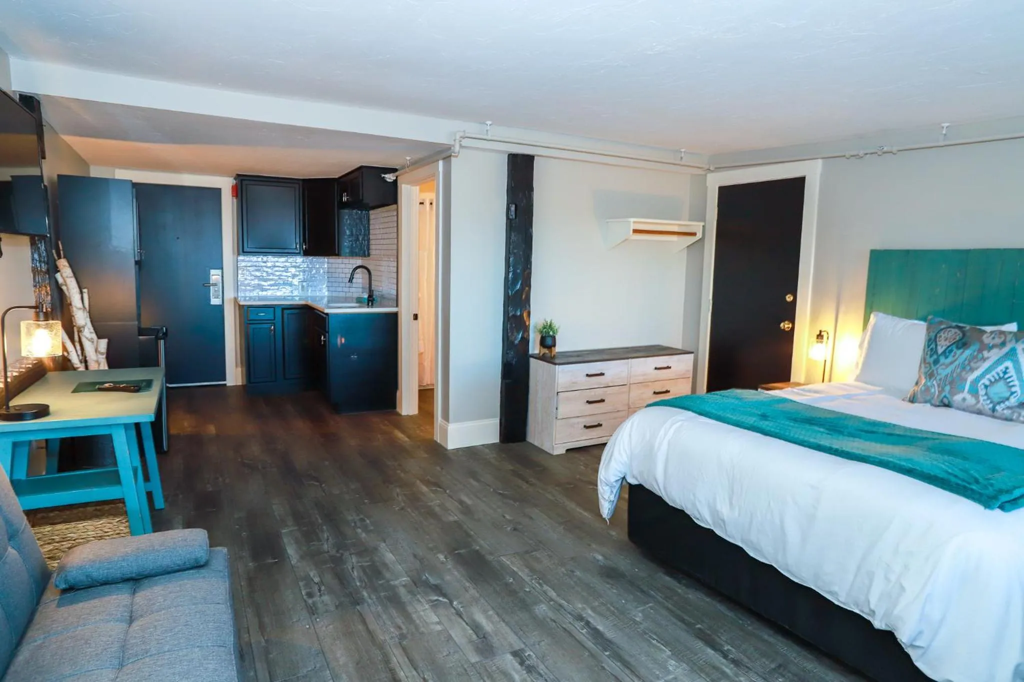 Bed in Gunstock Inn & Suites