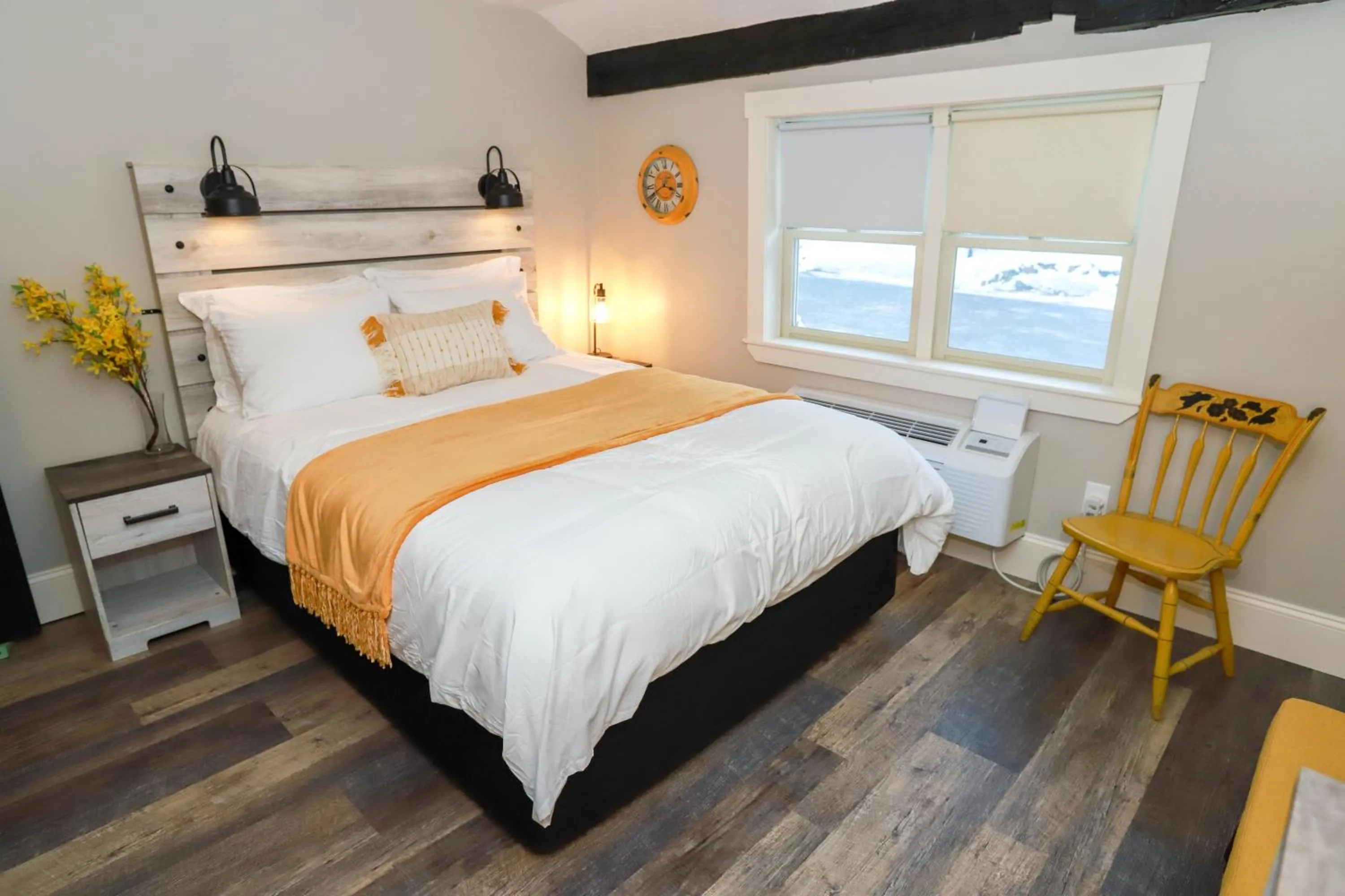 Bed in Gunstock Inn & Suites