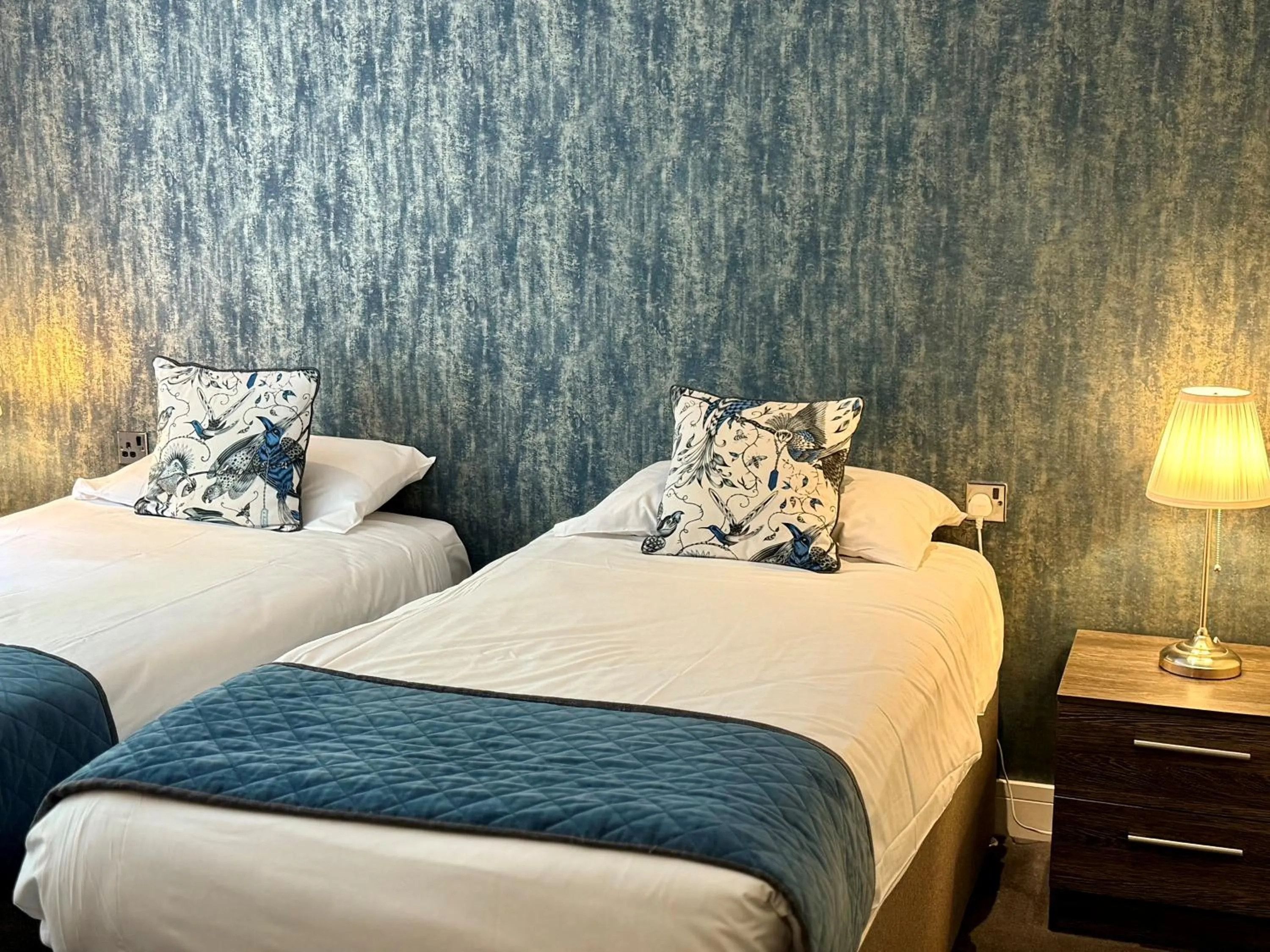 Bed in Wild Pheasant Hotel & Spa