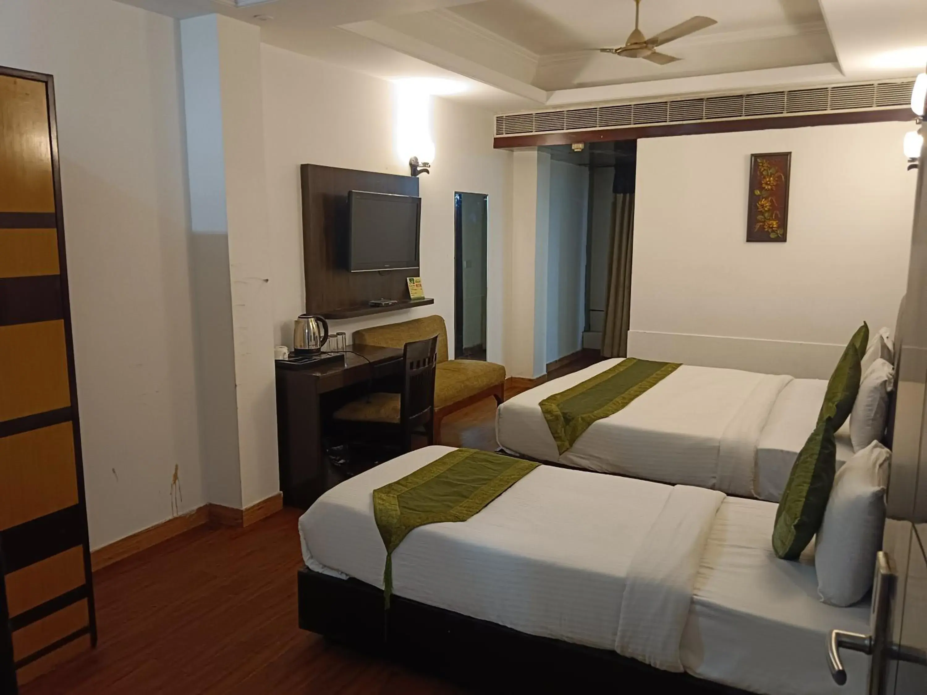 Triple Room with Private Bathroom in Hotel WTI Airport Grand Delhi Triple Room with Private Bathroom in Hotel WTI Airport Grand Delhi