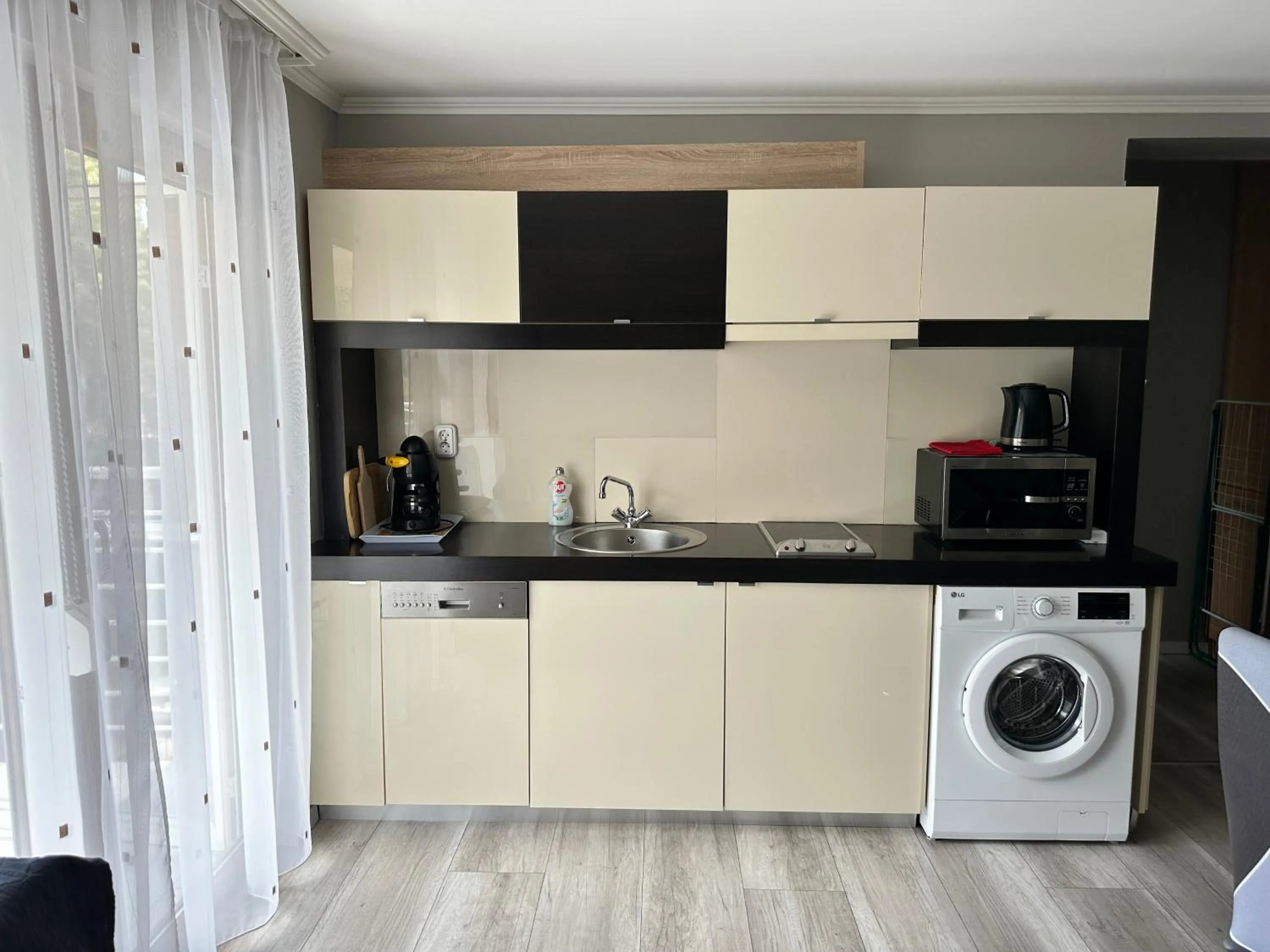 washing machine in Dorina Wellness Apartman