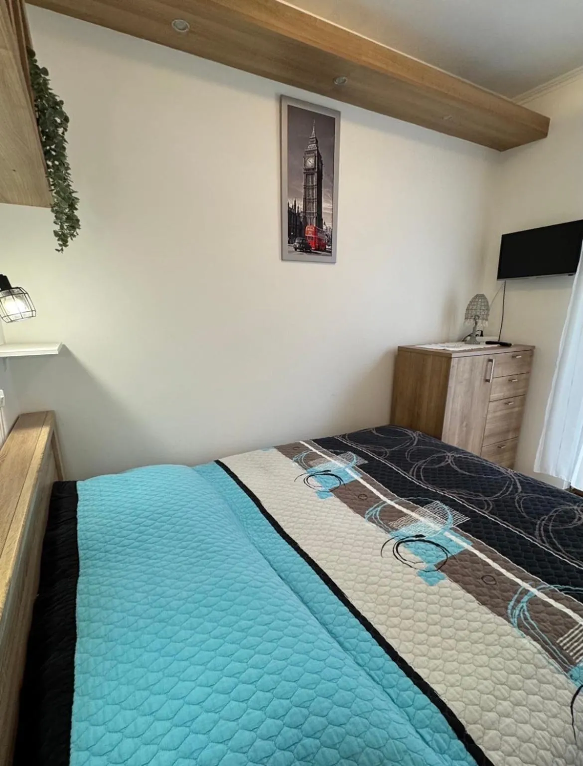 Bed in Dorina Wellness Apartman