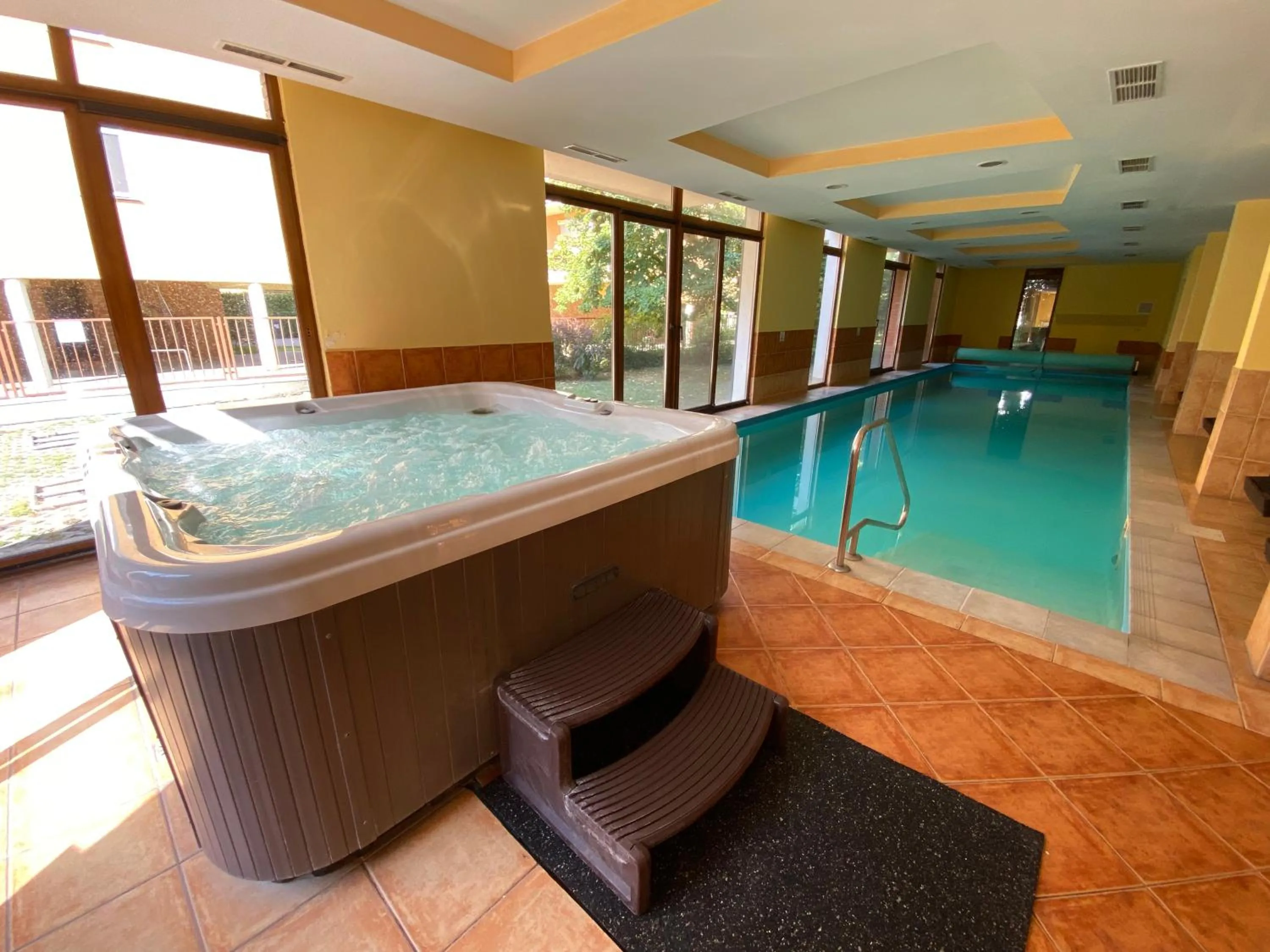 Swimming pool in Dorina Wellness Apartman