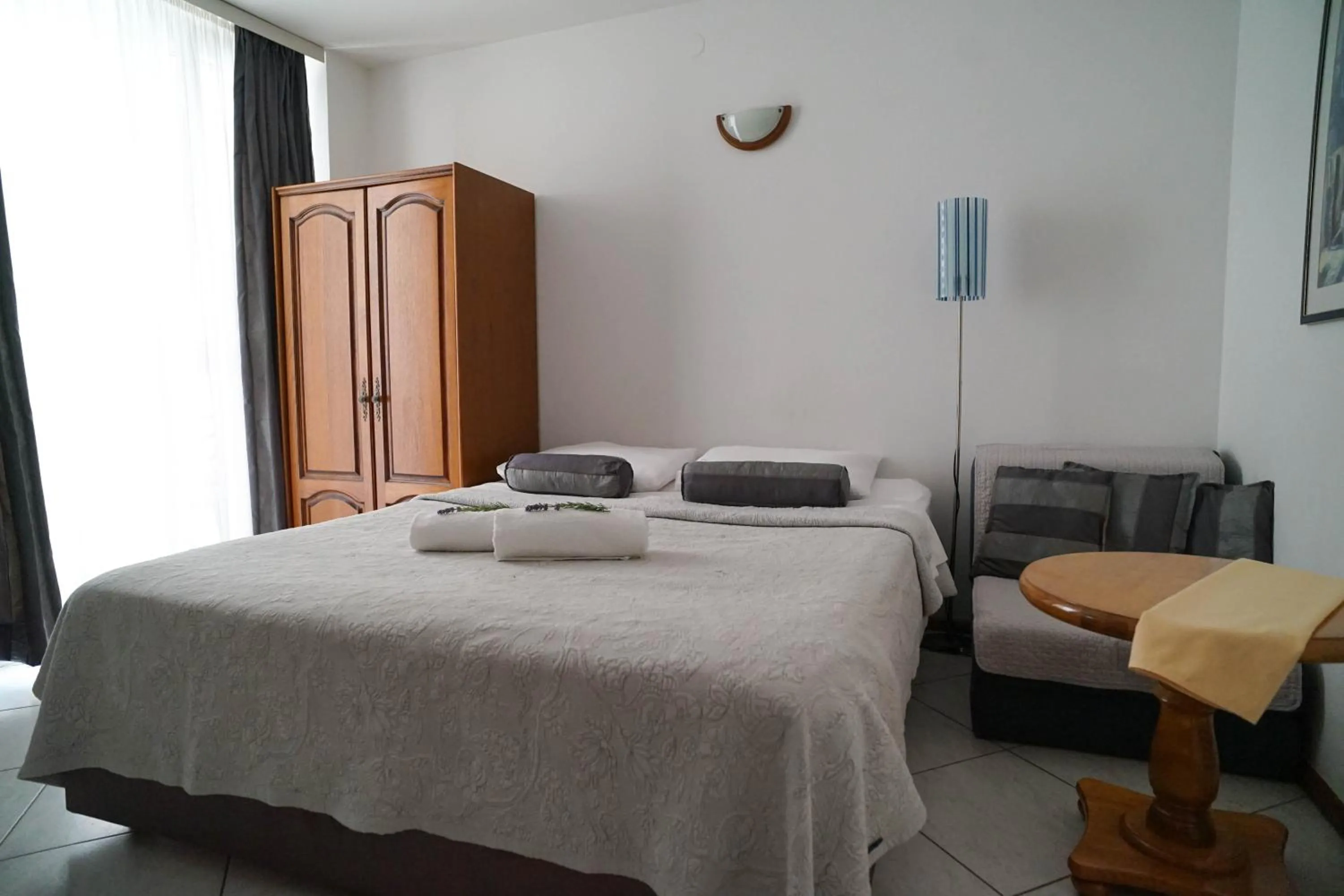 Bed in Apartments and Rooms Degra