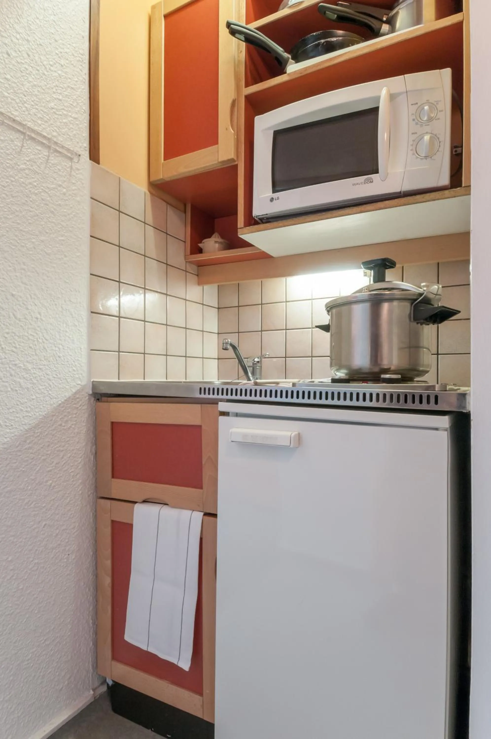 Kitchen or kitchenette in Résidence Pierre & Vacances Les Bleuets