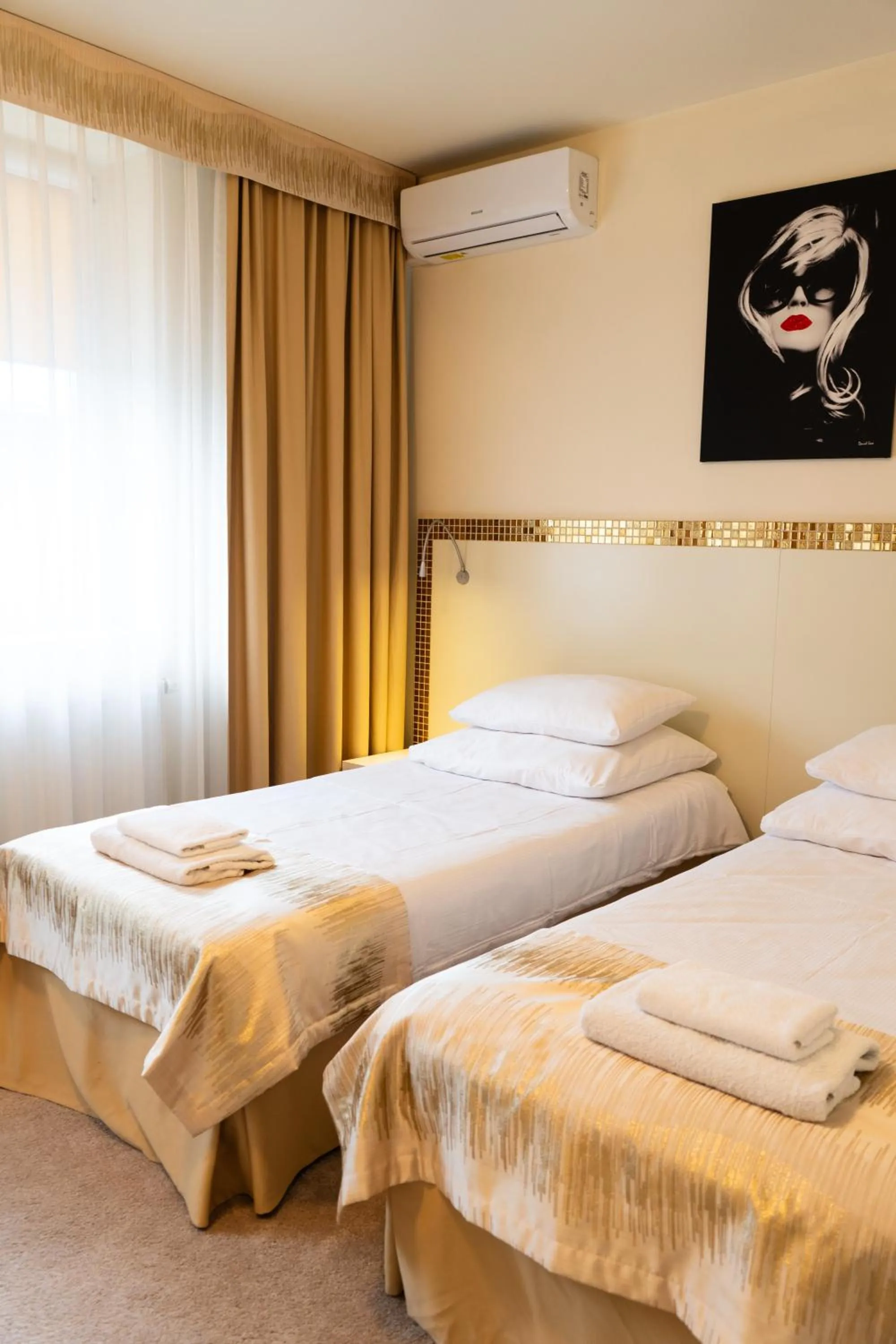 Bed in Hotel Court Wellness&Spa