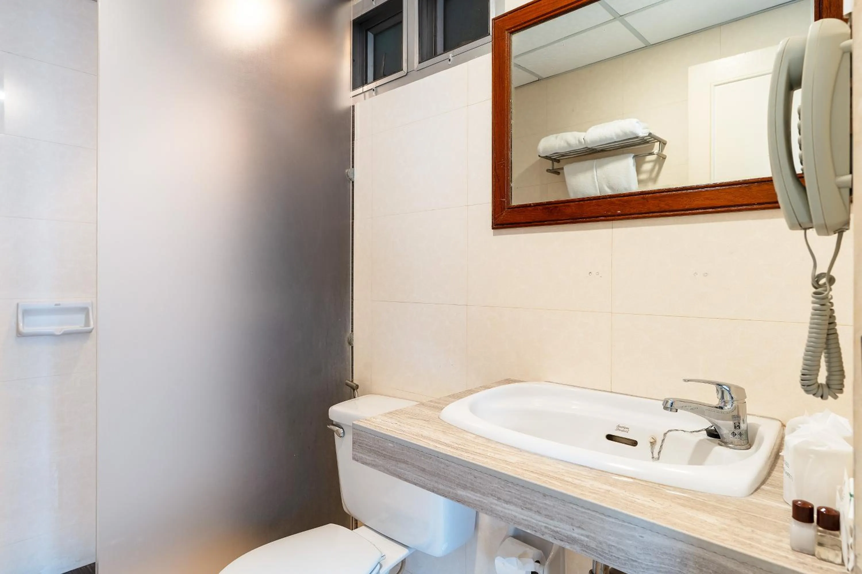 Toilet in Summit Pavilion Hotel