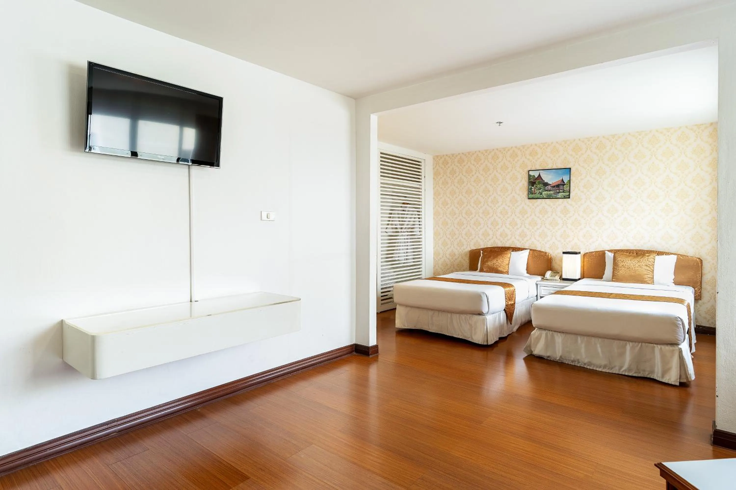 Bed in Summit Pavilion Hotel