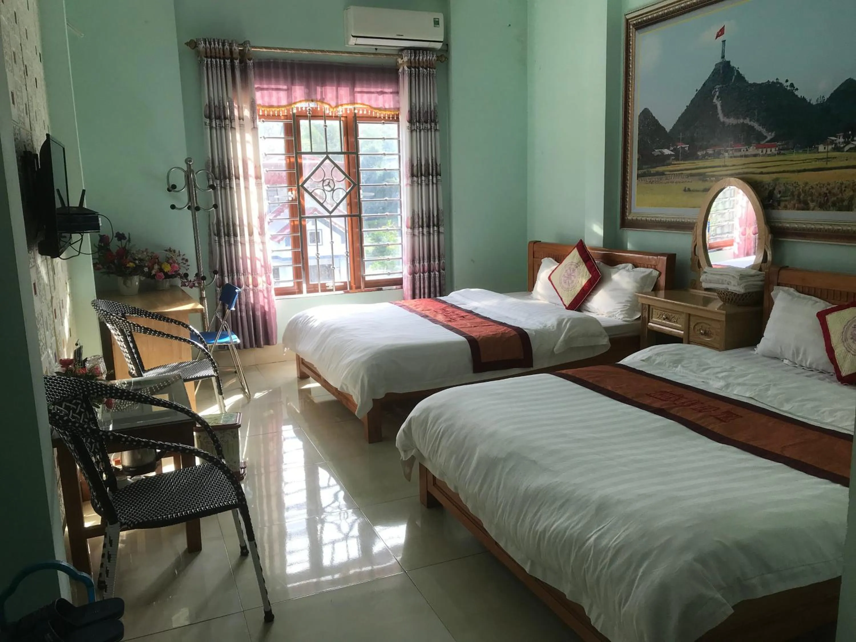 Bed in Yen Minh Hotel Thien An