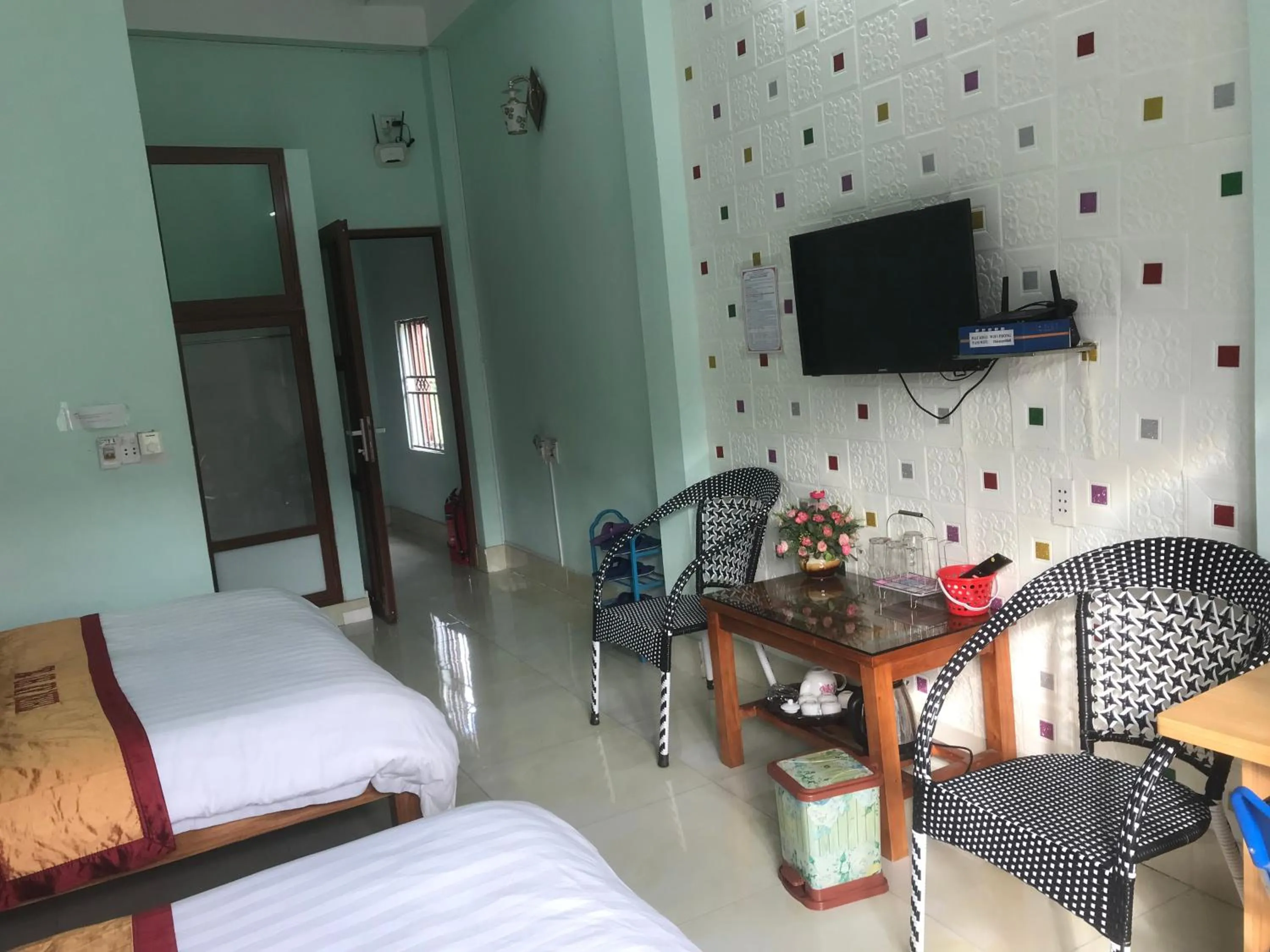 Bed in Yen Minh Hotel Thien An