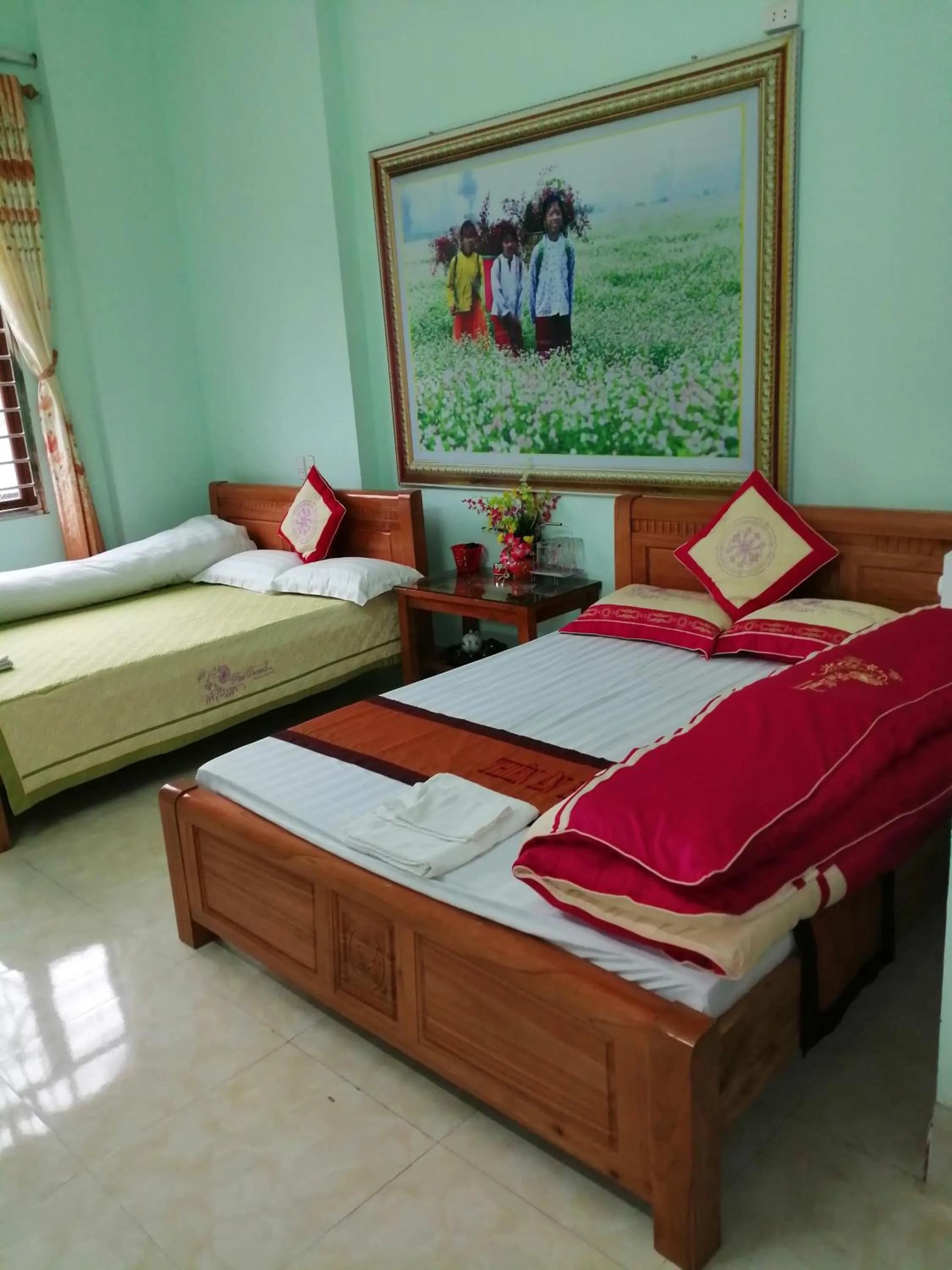Bed in Yen Minh Hotel Thien An