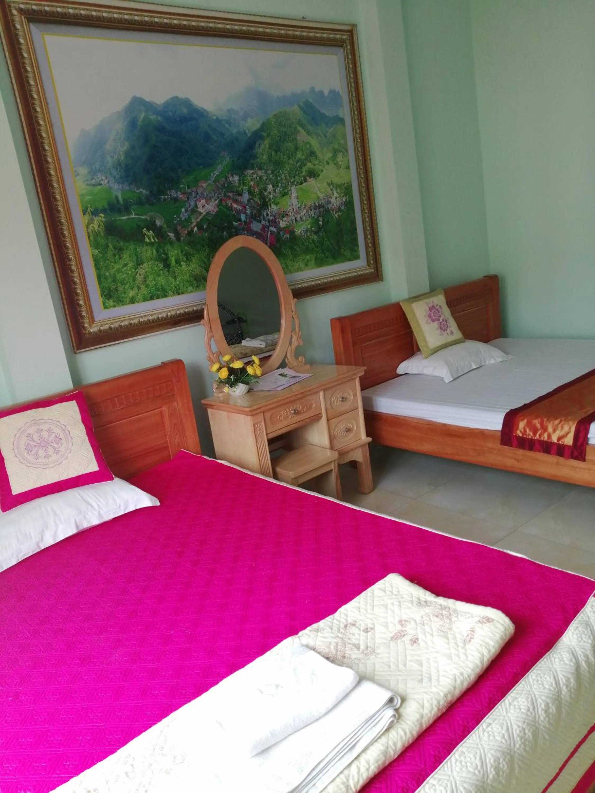 Bed in Yen Minh Hotel Thien An