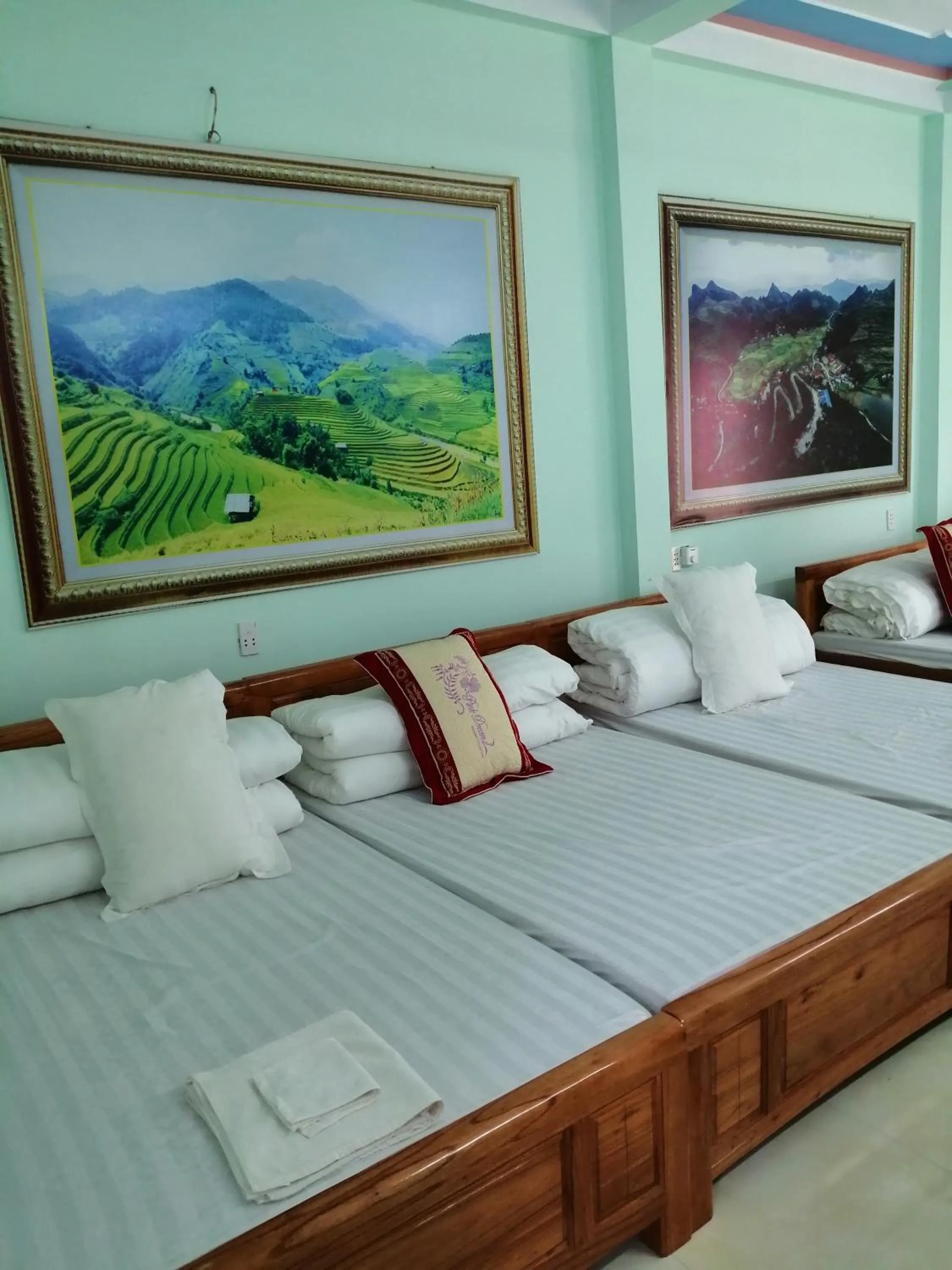 Bed in Yen Minh Hotel Thien An